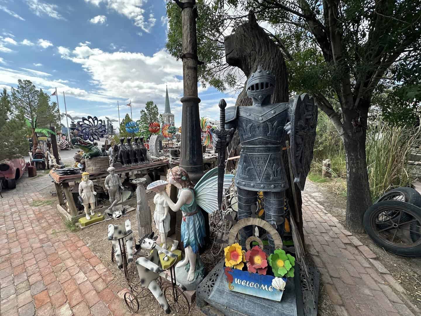 Large metal yard-art statues in the outdoor lot at The Whoopee Bowl Antique Mall in Canutillo, Texas