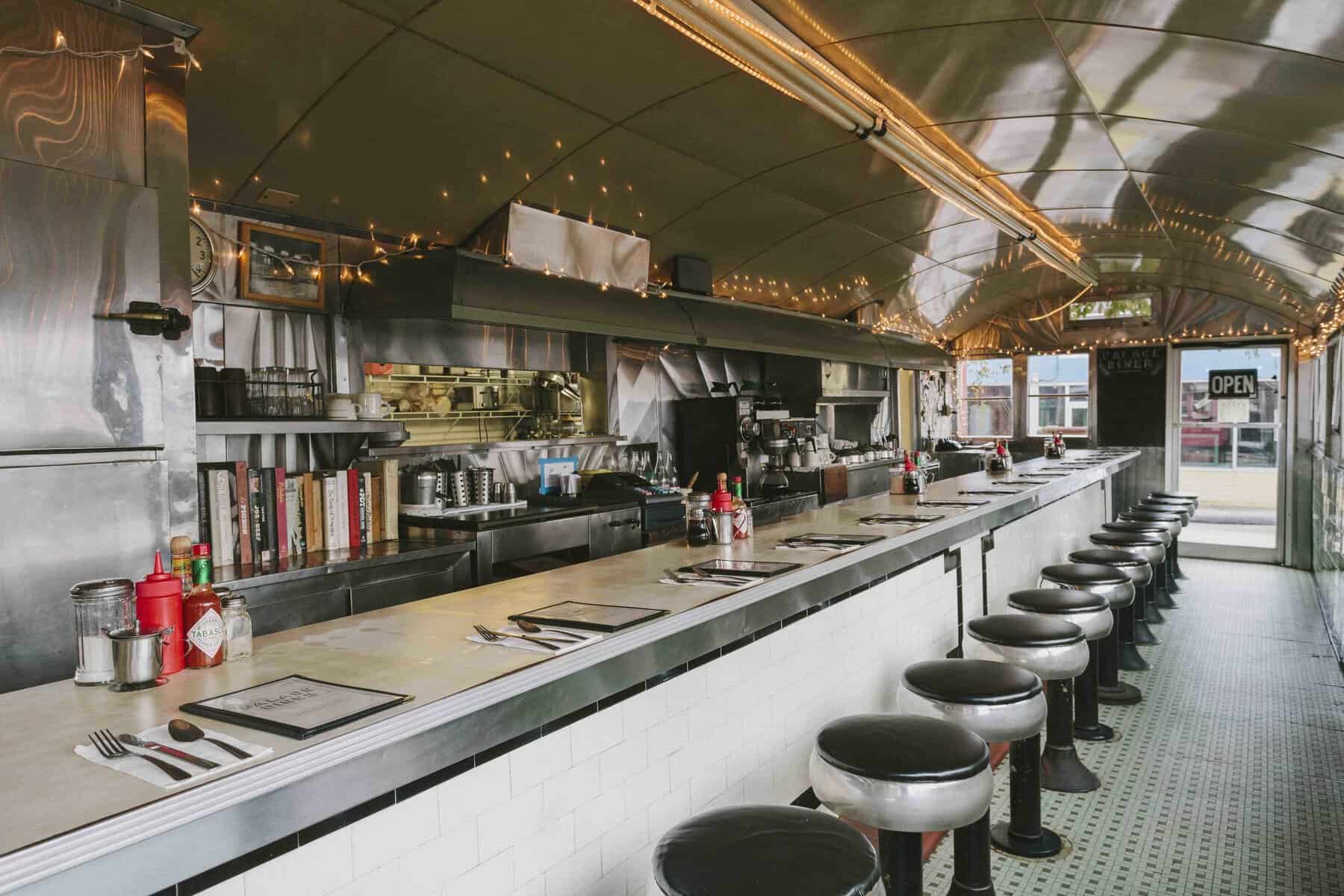 Vintage dining car counter and stools inside Palace Diner in Biddeford, Maine