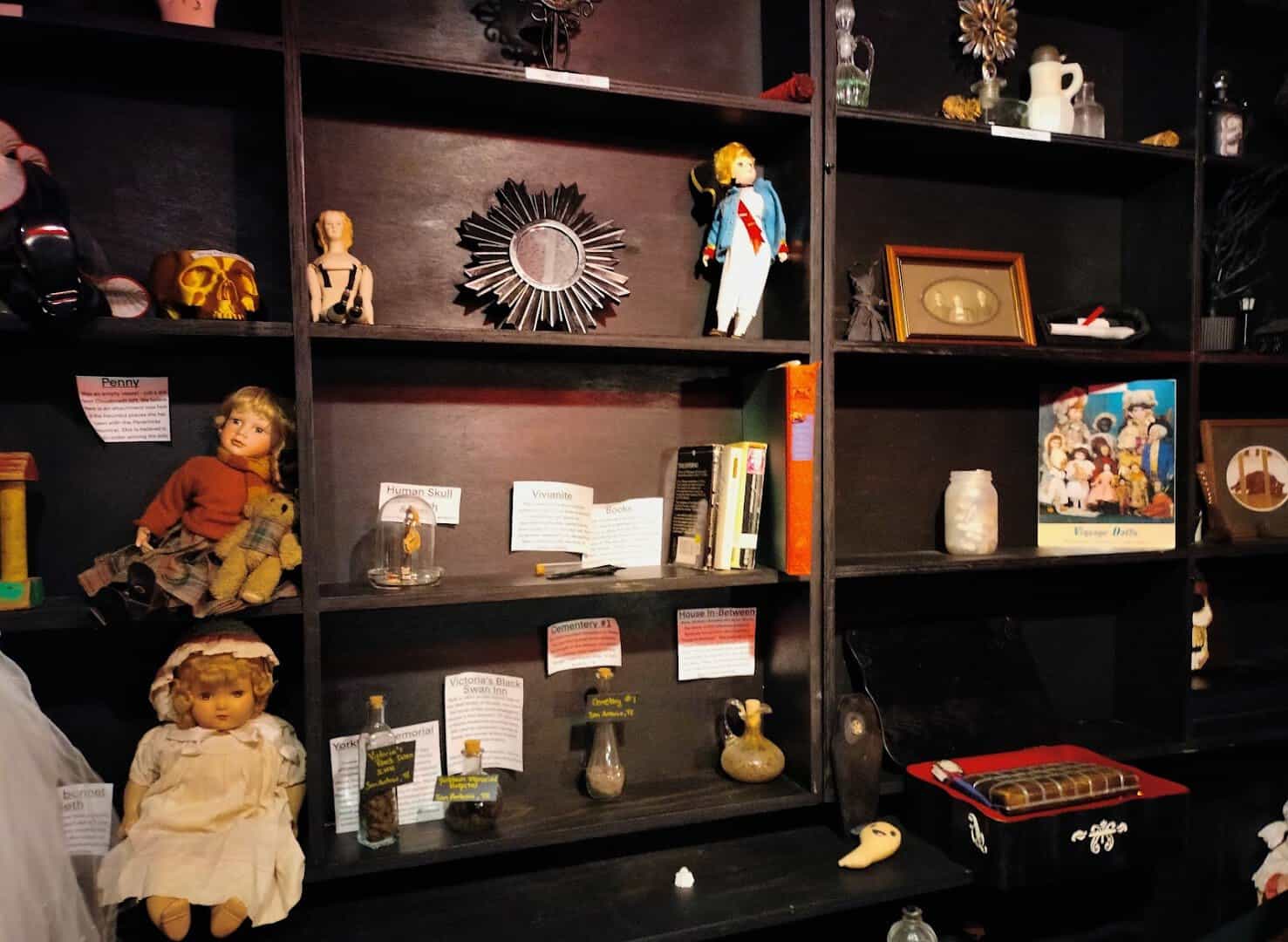 Antique dolls and curiosities in the ParaPeculiar haunted museum at Triple Six Social