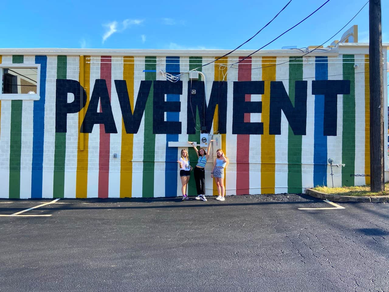 Pavement store name on the rainbow striped exterior wall in Austin