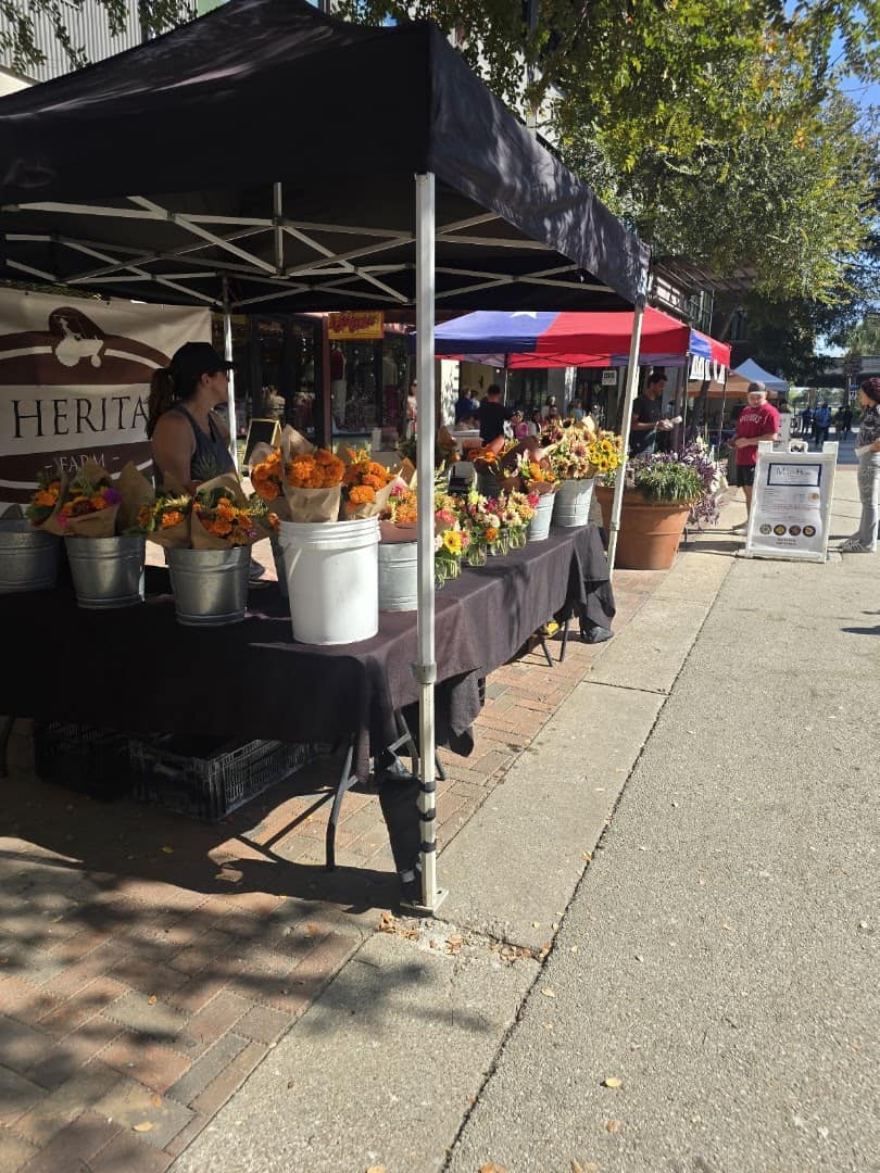 A flower vendor stall at the Pearl Farmers Market in San Antonio, Texas