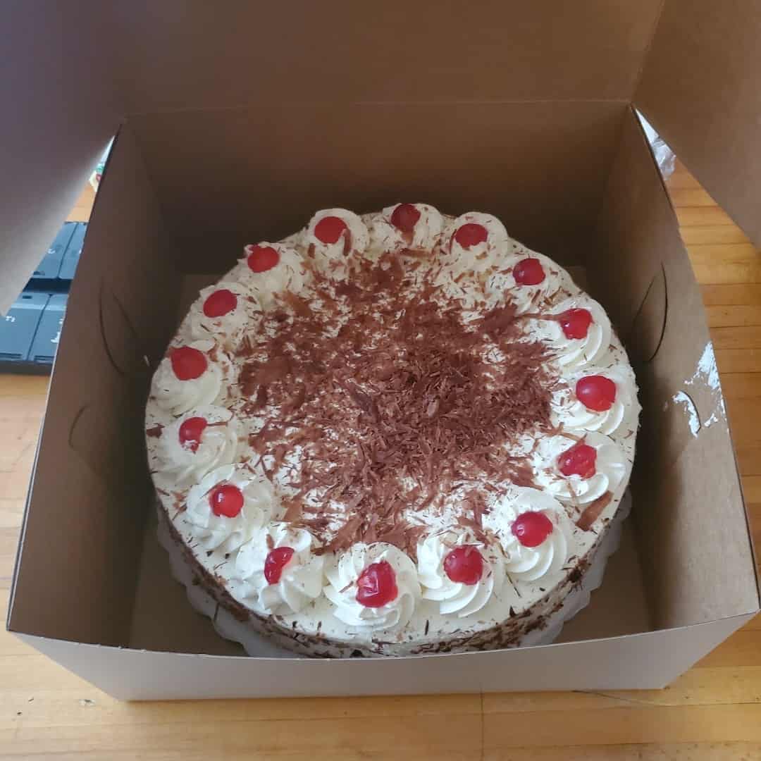 Black Forest cake with whipped cream and cherries from Pfeifer's German Bakery in Harker Heights, Texas