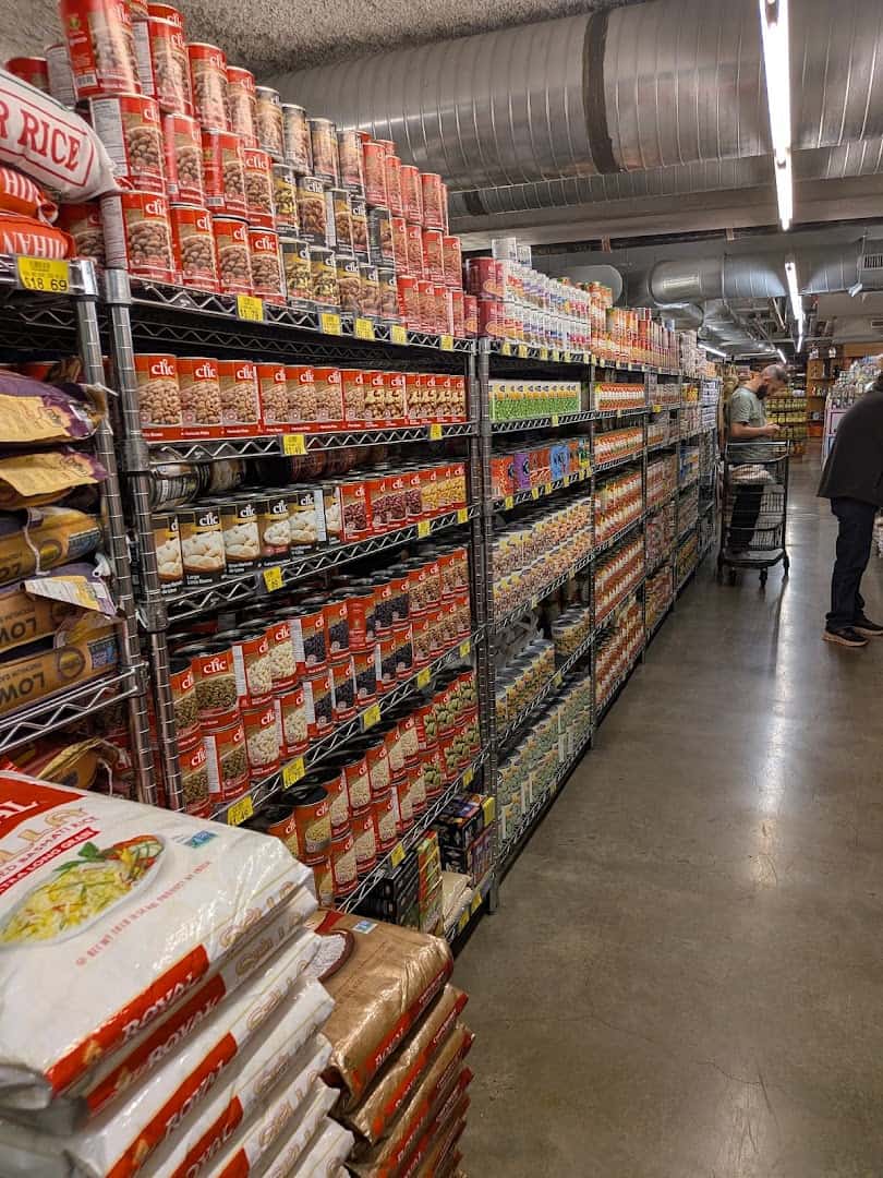 Aisle of international pantry goods at Phoenicia Specialty Foods in Houston
