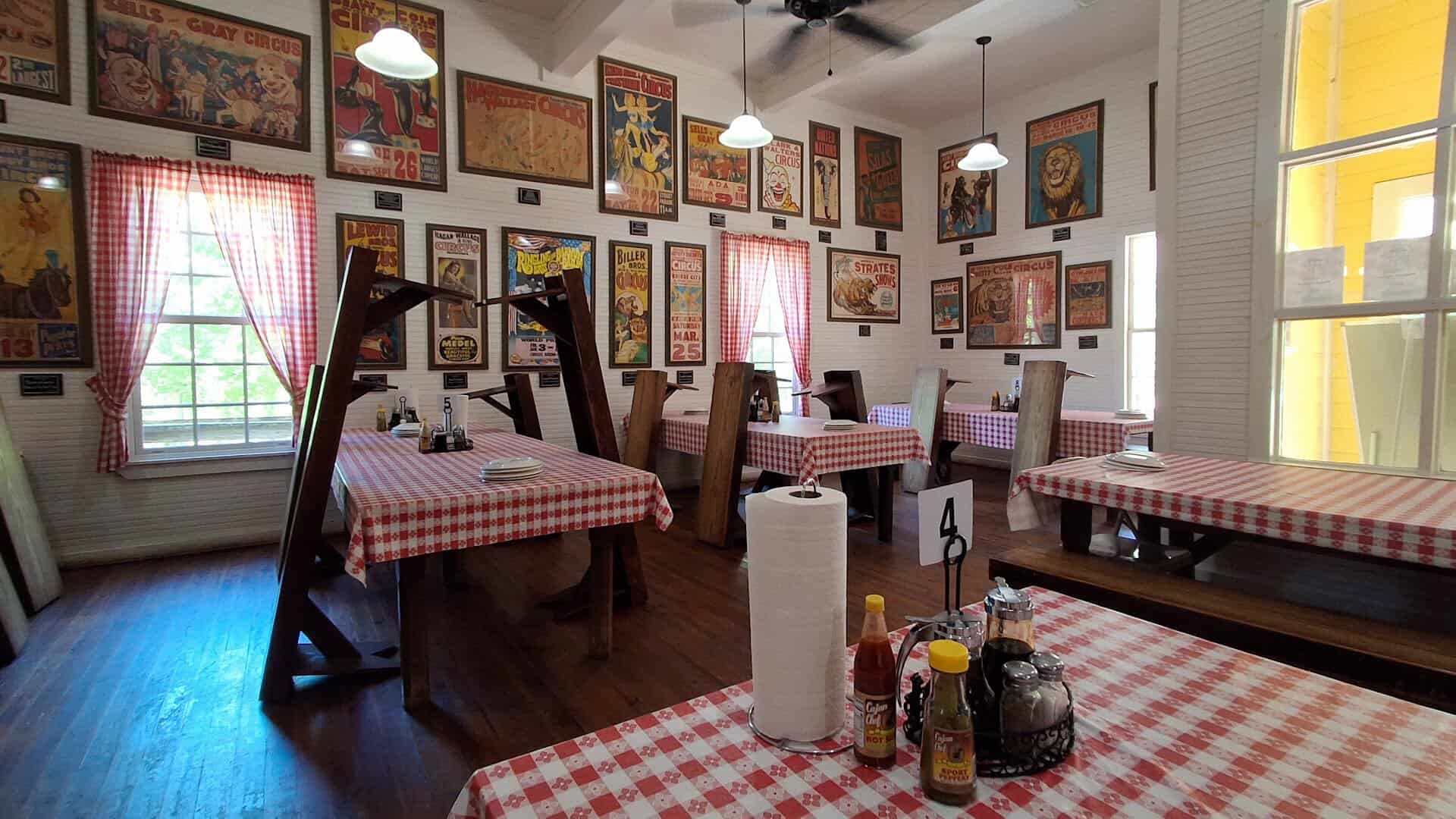 Dining room with set tables at Pickett House Restaurant in Woodville, Texas