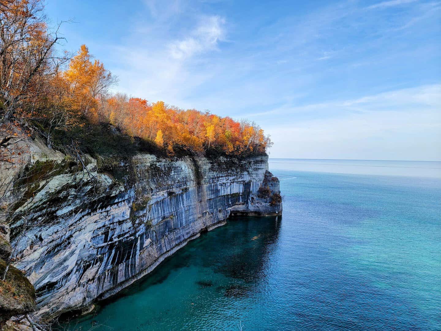 Mineral-streaked sandstone cliffs above Lake Superior at Pictured Rocks near Munising, Michigan