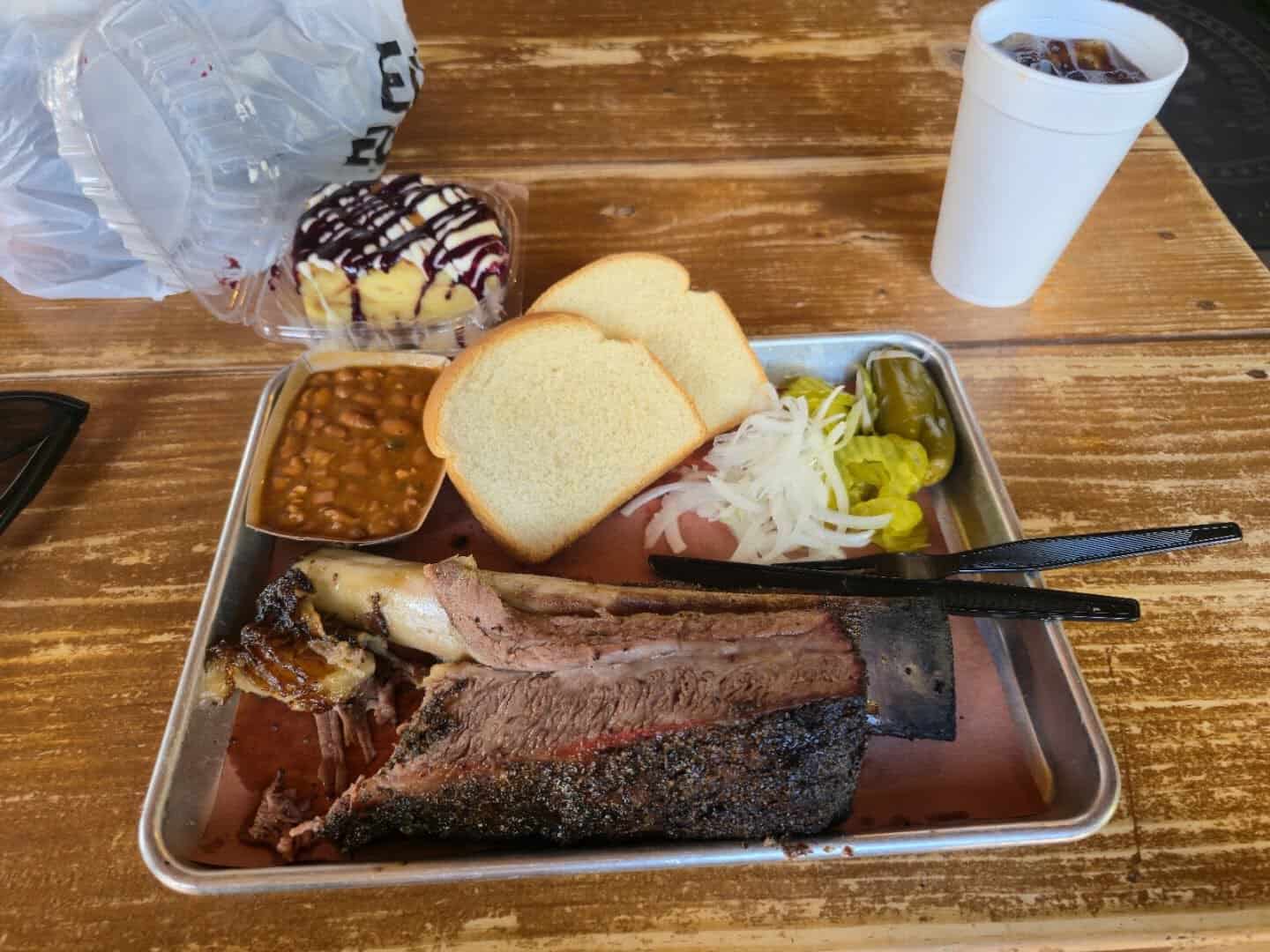 Brisket plate with beans and dessert at Pinkerton's Barbecue in Houston