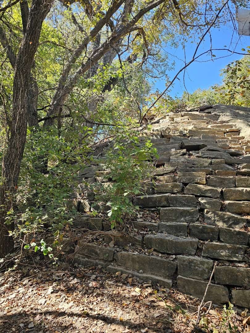Close-up of the hand-cut limestone blocks of the Possum Kingdom Stone Arch Bridge in Texas