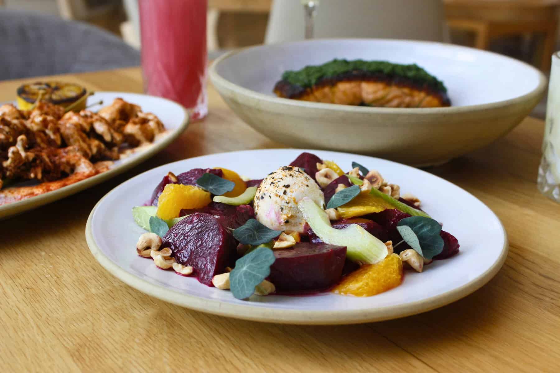 Plated fish and beet salad at The Preachers Son in Bentonville, Arkansas