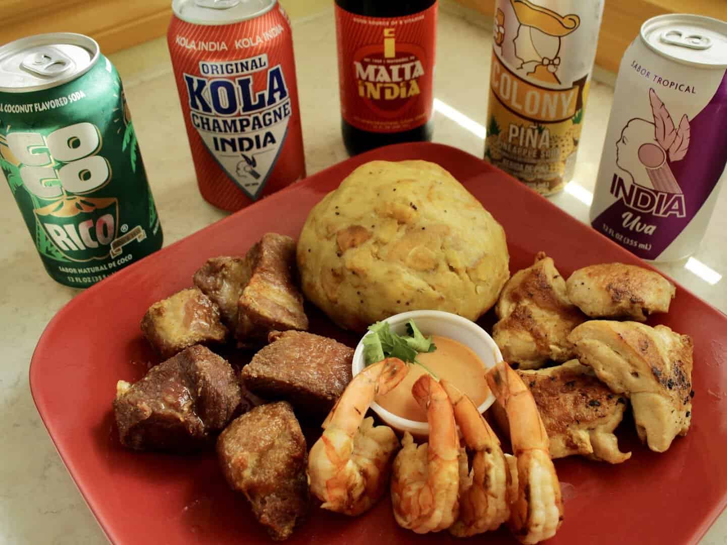Plate of carne frita, shrimp, chicken and mofongo at Tex-Chick in Houston