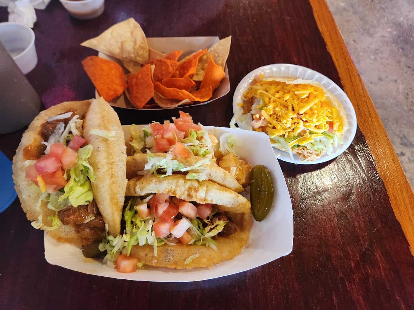 Beef and chicken puffy tacos with chips at Ray's Drive Inn in San Antonio