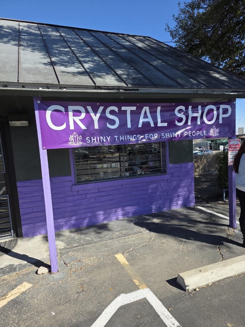The purple storefront of Shiny Things For Shiny People crystal shop on South Lamar in Austin