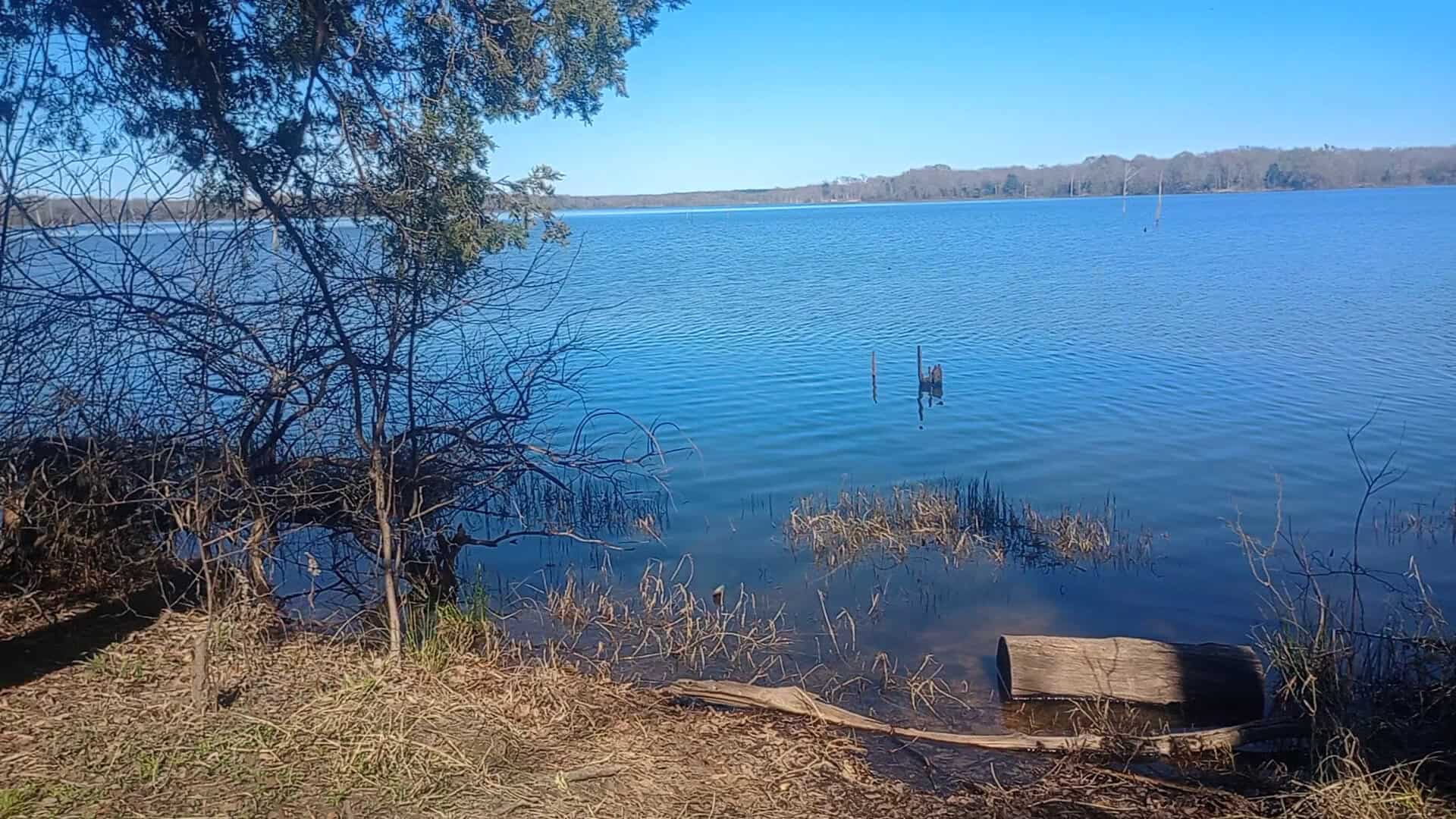 Calm open water of the lake at Purtis Creek State Park in Eustace Texas
