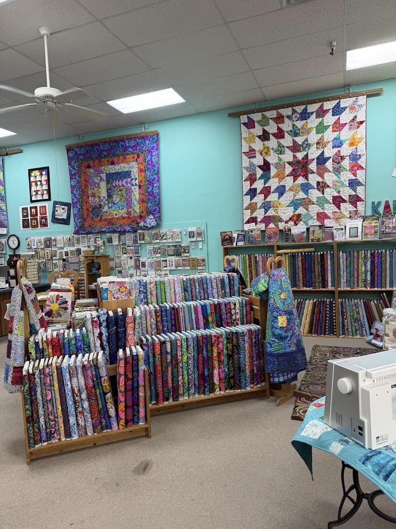 The bright, welcoming interior of Quilt Country in Lewisville, Texas