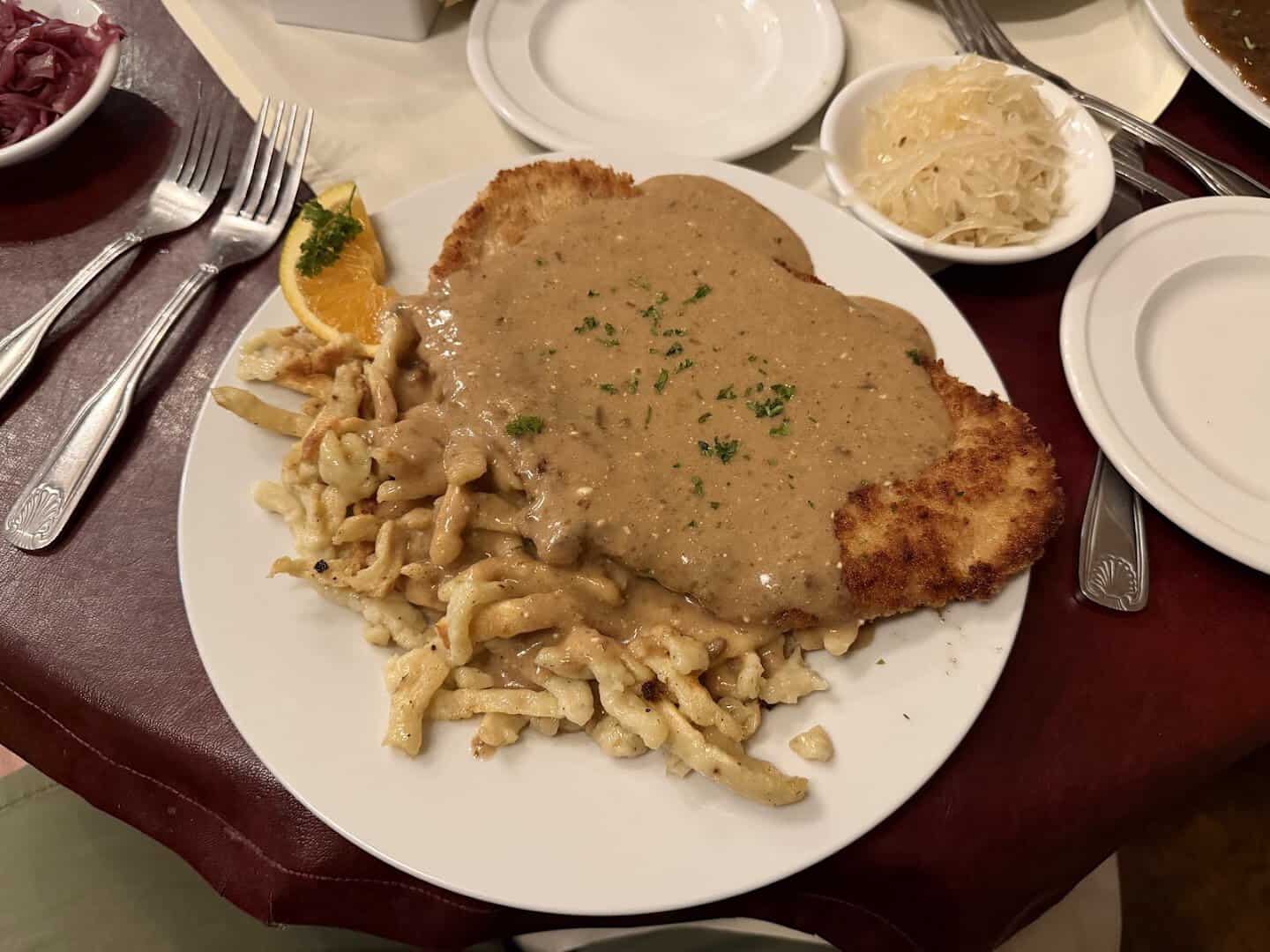 Rahm schnitzel with cream sauce over spaetzle at Alpine Haus in New Braunfels