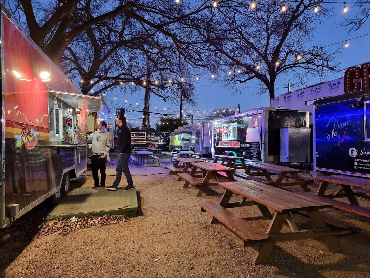 Food trucks and string lights along Rainey Street in Austin, Texas