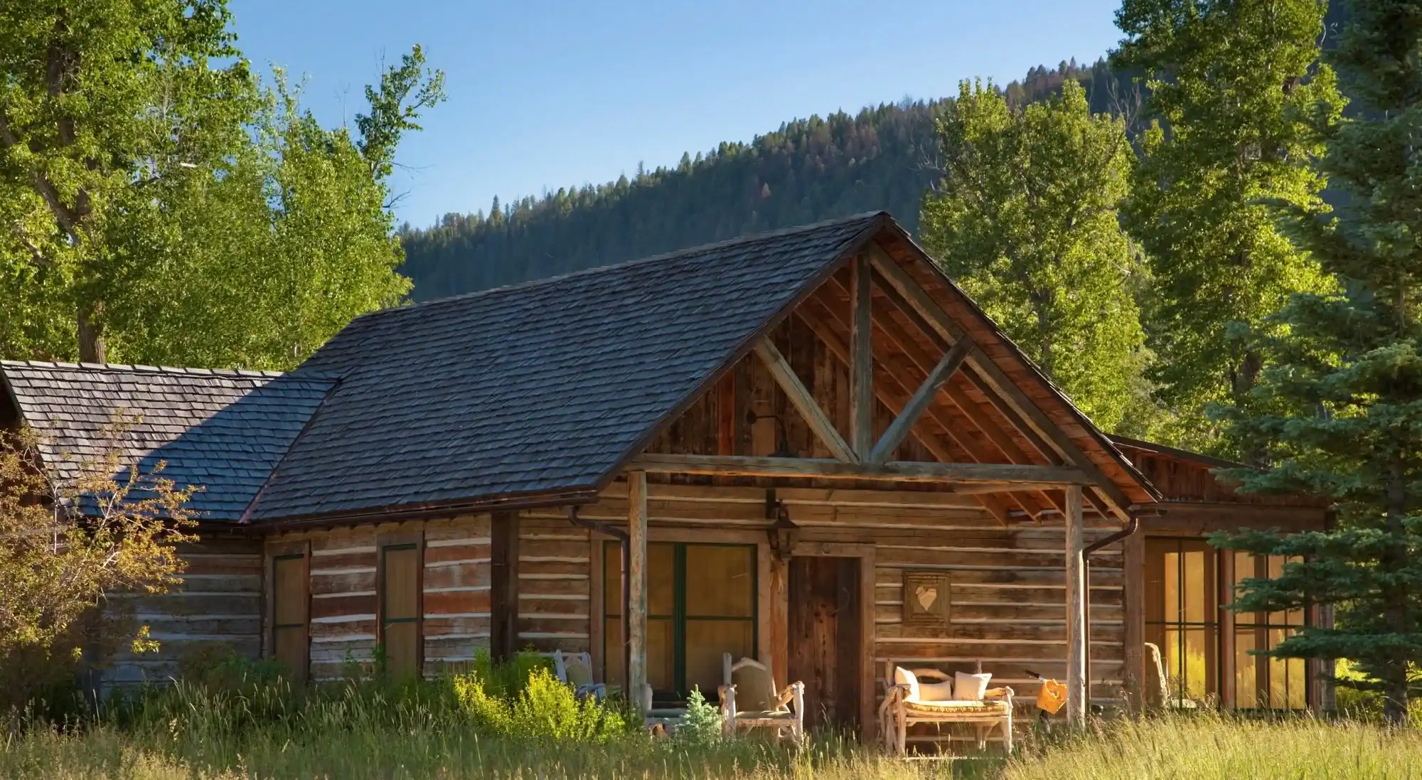 Log cabin tucked in the forest at The Ranch at Rock Creek near Philipsburg, Montana