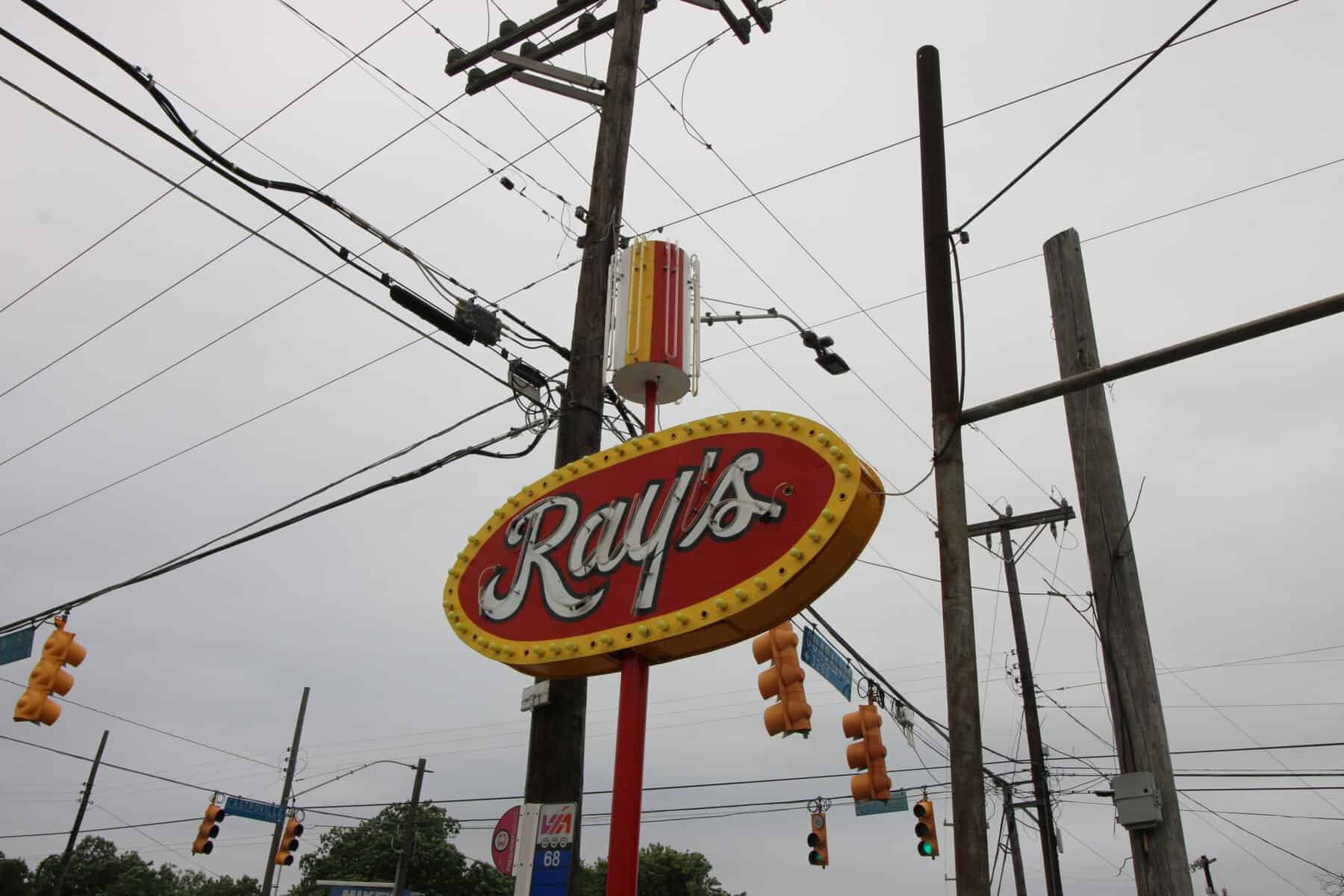 Ray's neon sign against the sky at Ray's Drive Inn in San Antonio