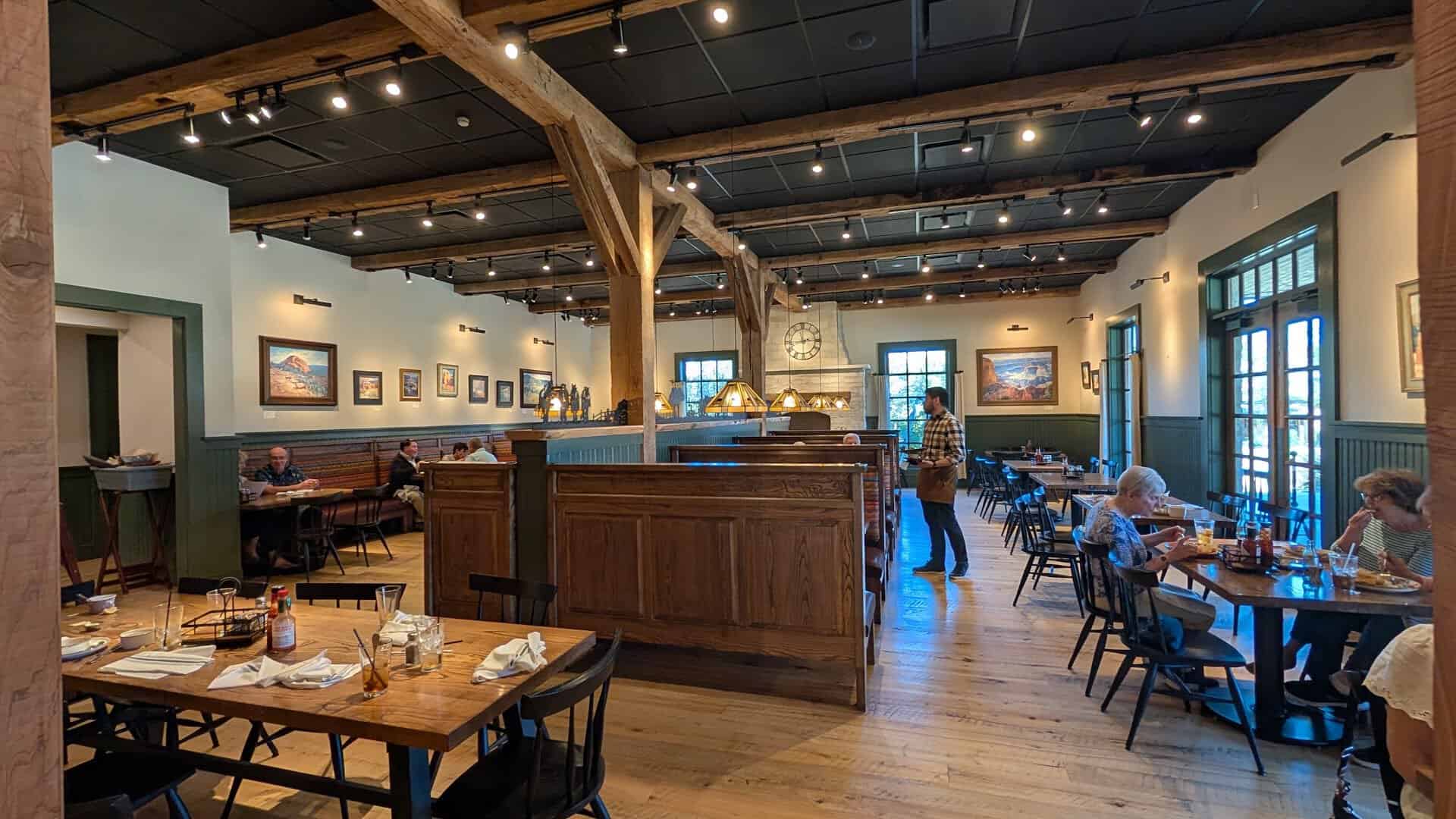 Rebuilt dining hall with vaulted timber ceilings at Cafe Homestead in Waco, Texas