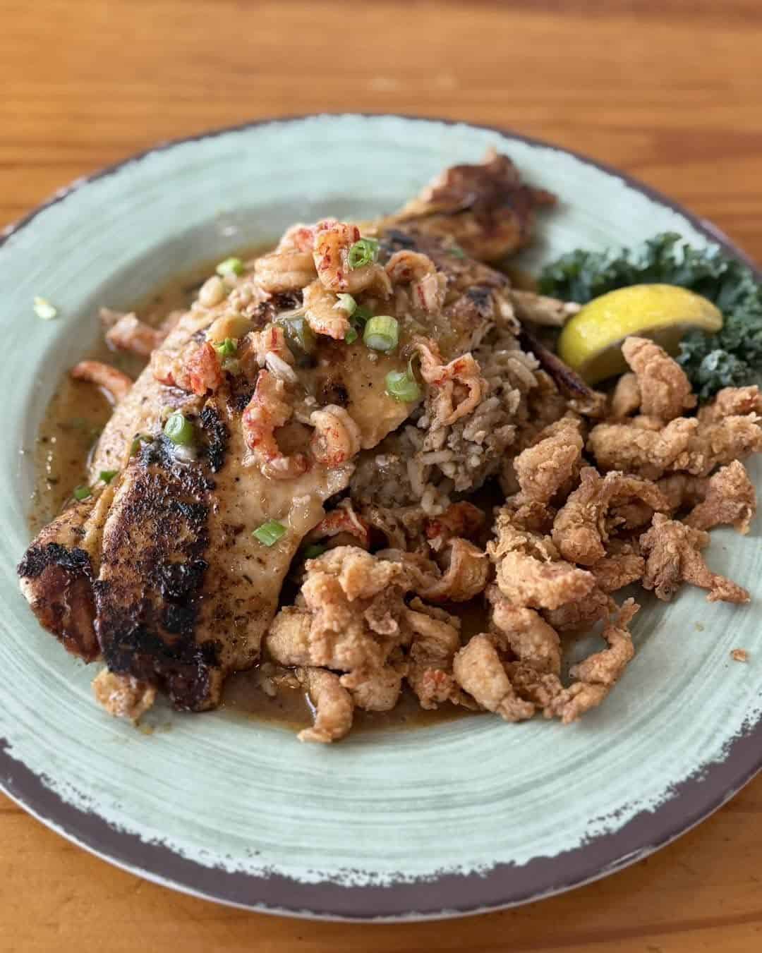 Redfish Louie topped with crawfish at Stingaree in Crystal Beach, Texas