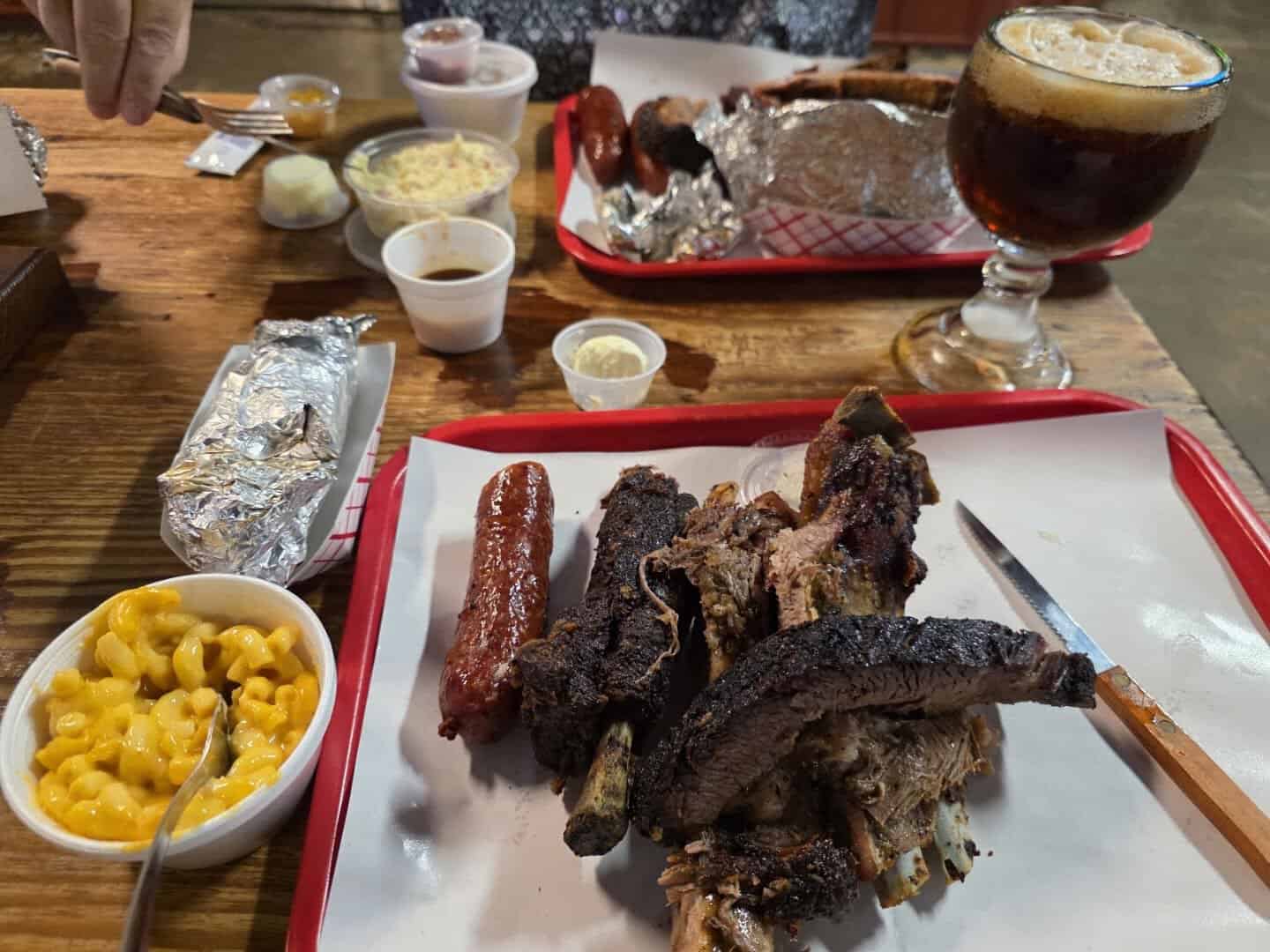 Barbecue plate with ribs, sausage and jalapeno mac and cheese at Cooper's in Fort Worth