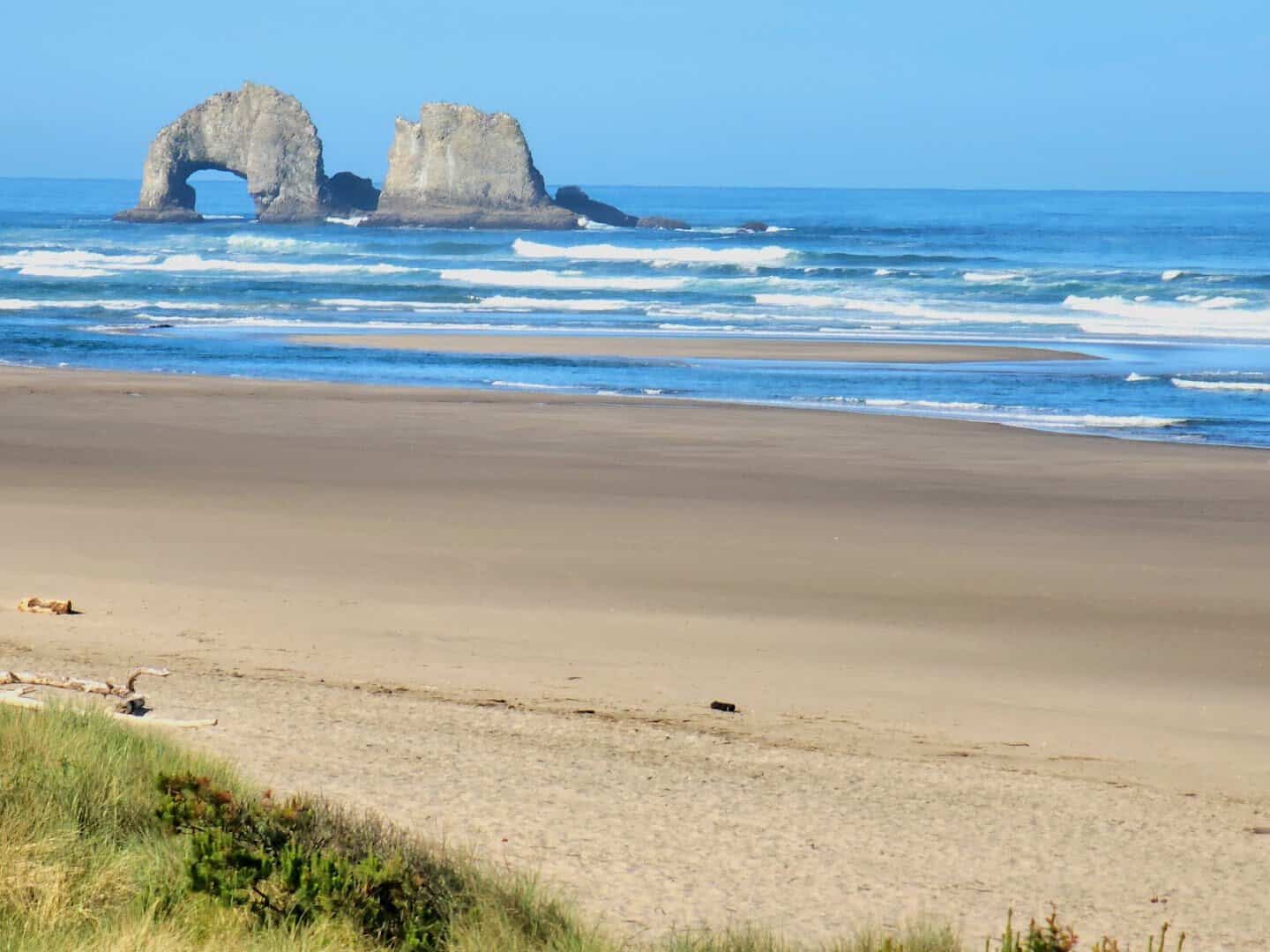 The Twin Rocks sea stacks off the beach at Rockaway Beach, Oregon