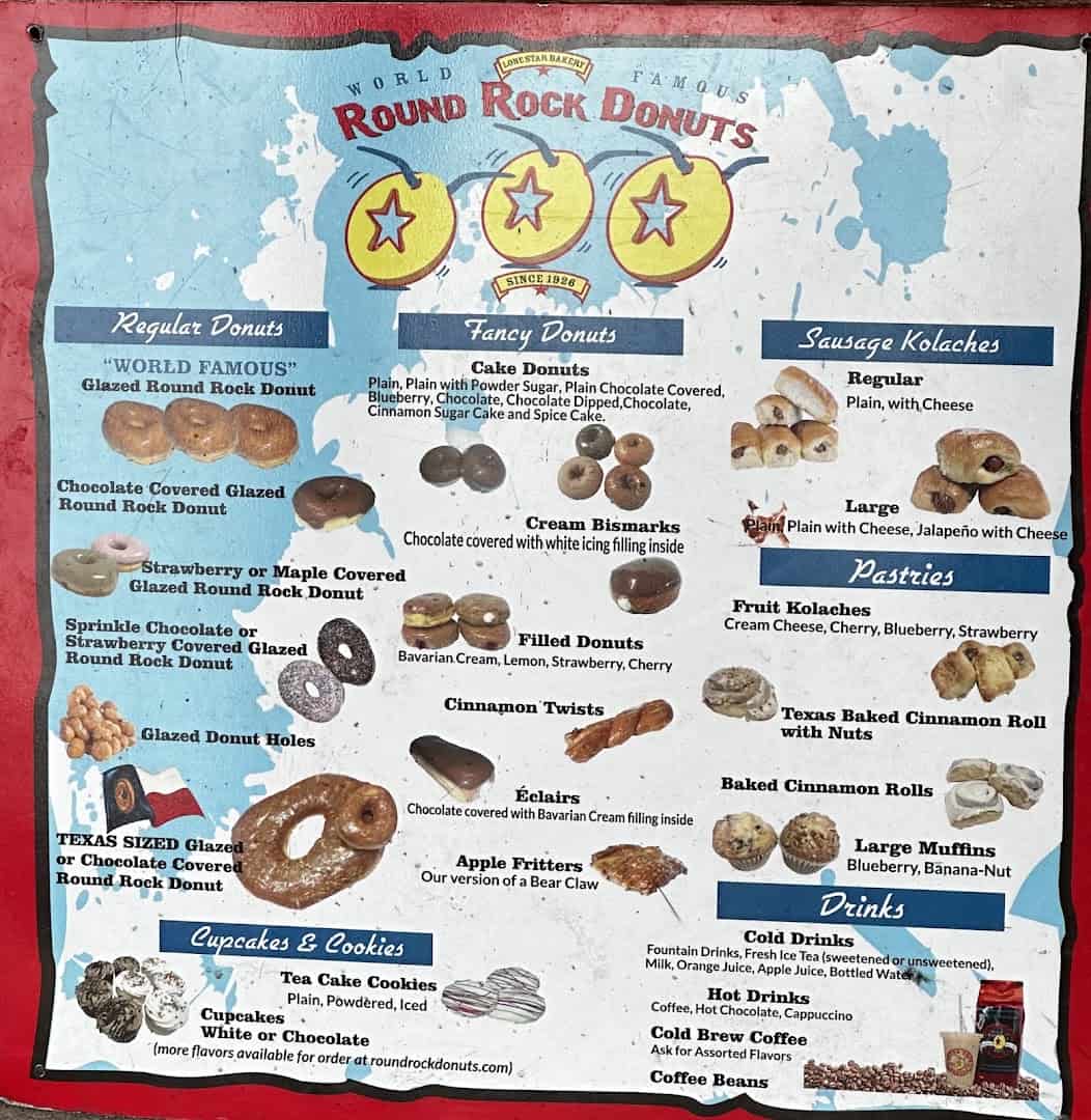 Round Rock Donuts menu board listing donuts, kolaches and drinks in Round Rock, Texas