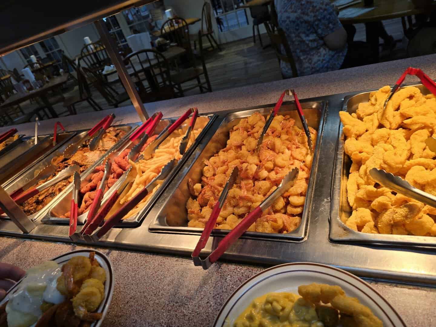 Fried catfish, shrimp and fries on the buffet line at Sam's Original Restaurant in Fairfield, Texas