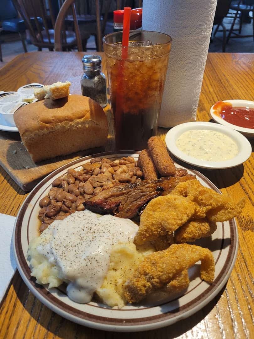 Fried catfish plate with beans, mashed potatoes and cornbread at Sam's Original Restaurant in Fairfield, Texas