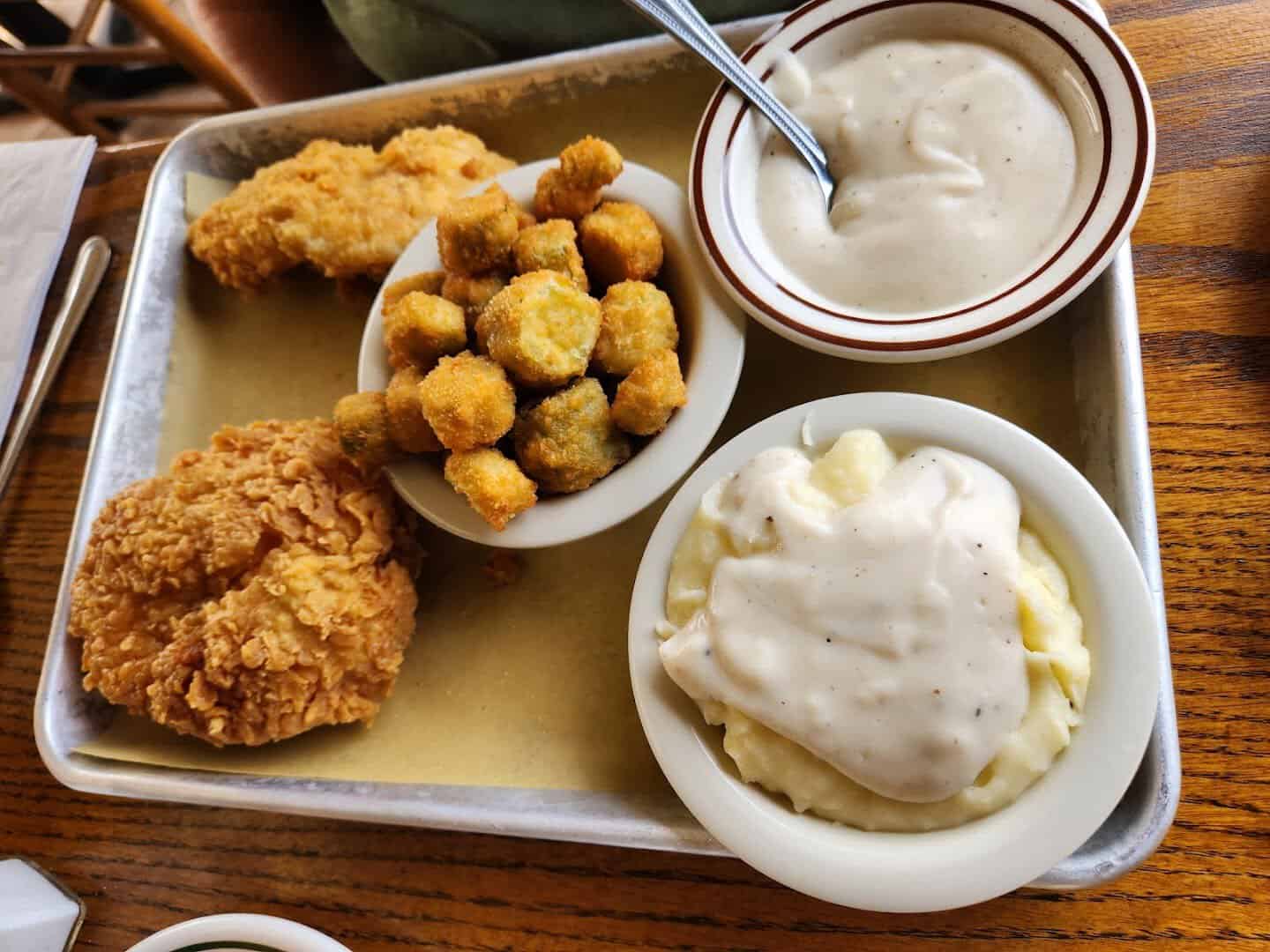 Fried chicken with fried okra and mashed potatoes and gravy at Sam's Original Restaurant in Fairfield, Texas