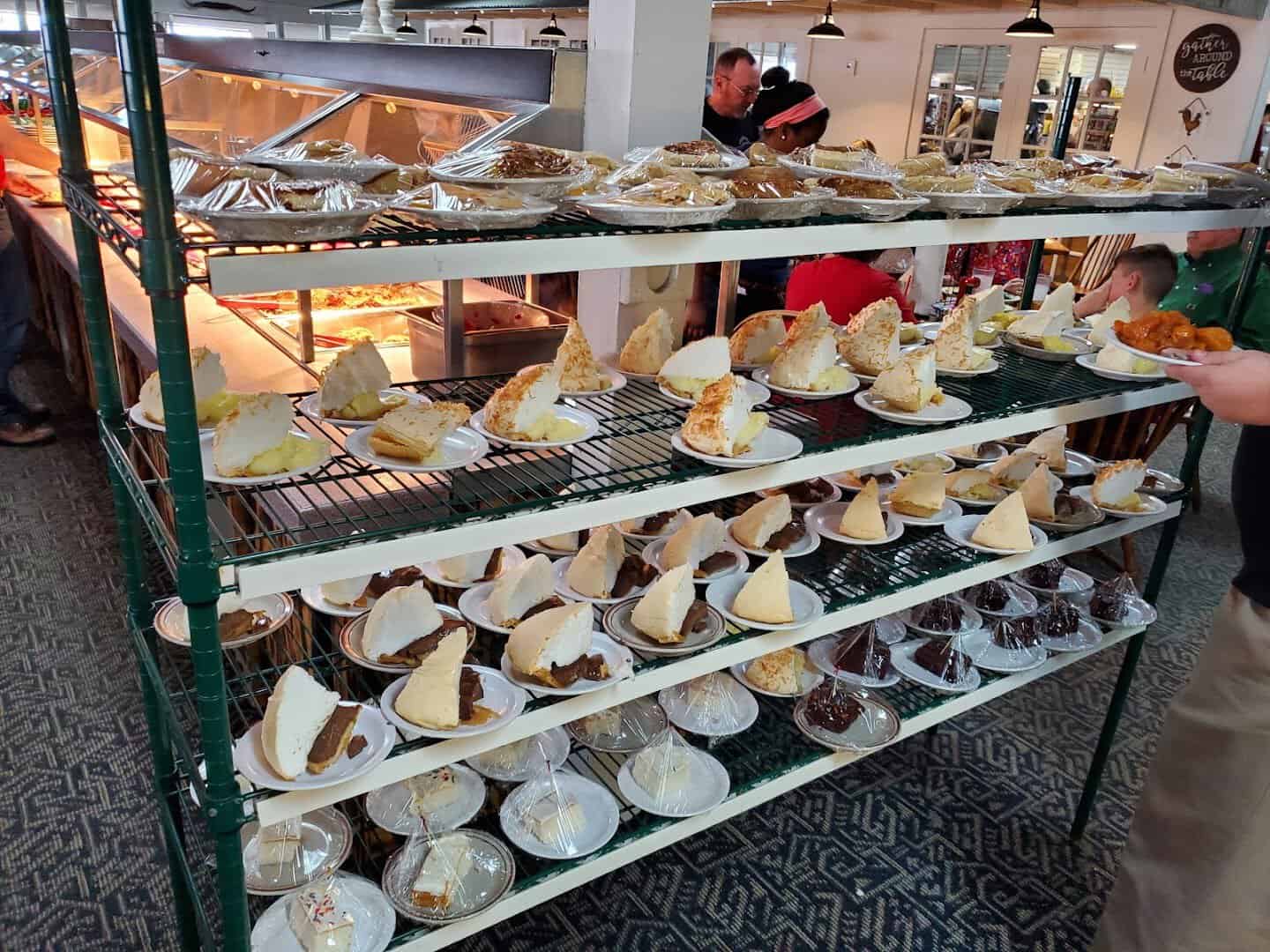 Rows of homemade meringue pies on the dessert rack at Sam's Original Restaurant in Fairfield, Texas