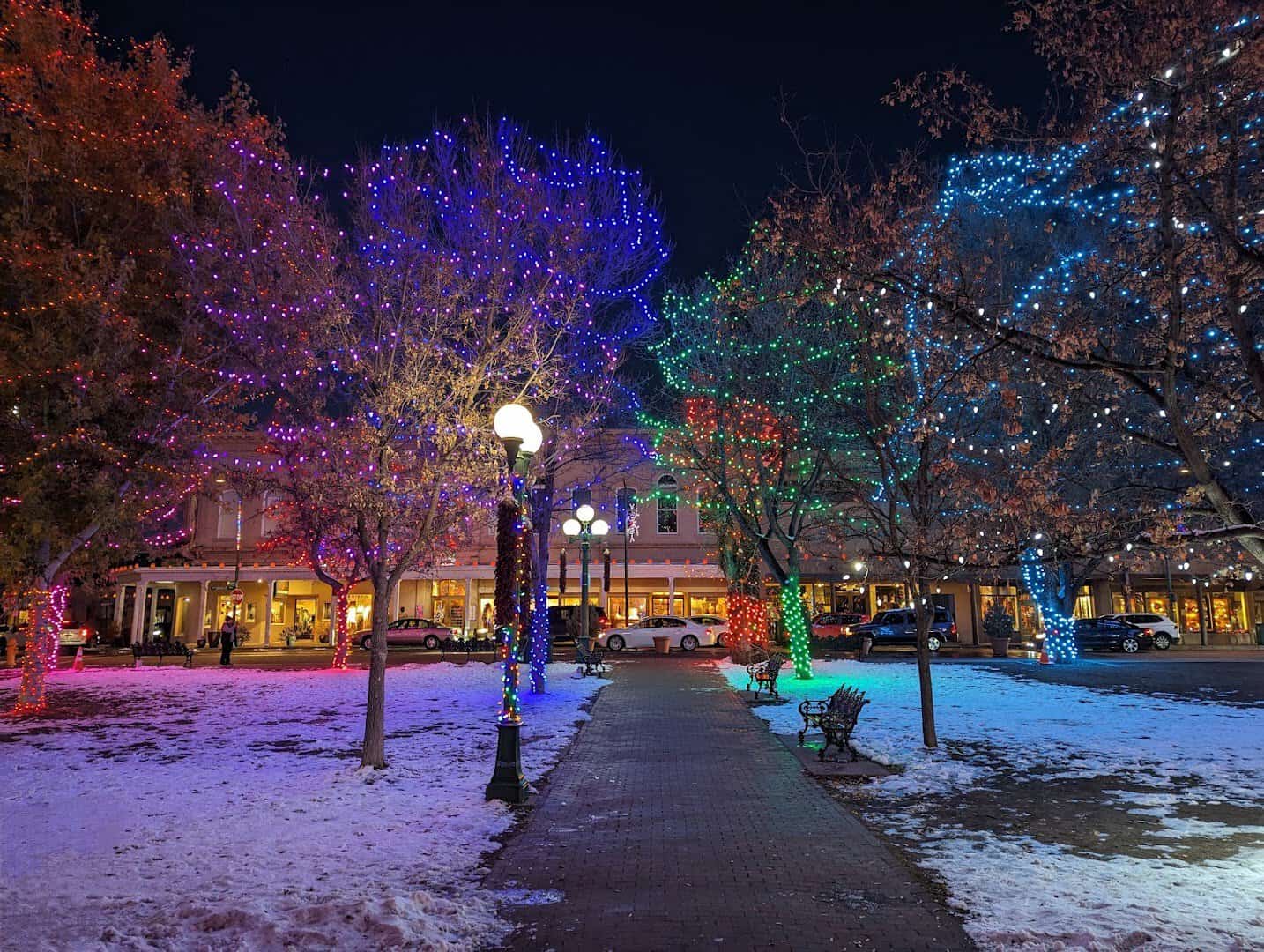 Santa Fe Plaza with holiday lights and snow in Santa Fe, New Mexico