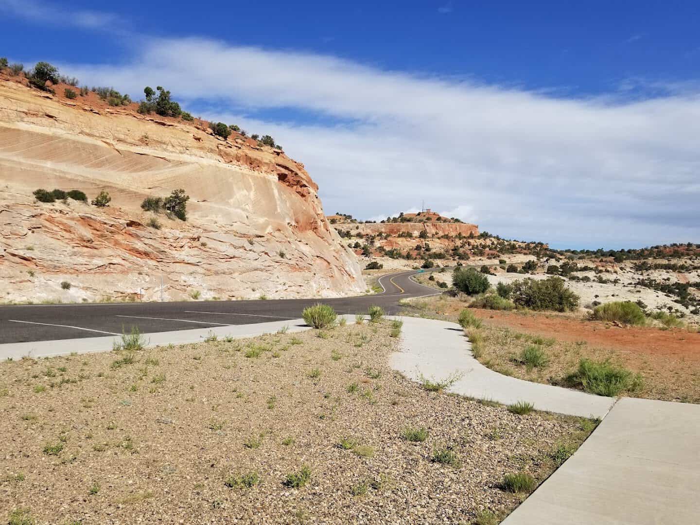 Scenic Byway 12 curving through red and white slickrock in southern Utah