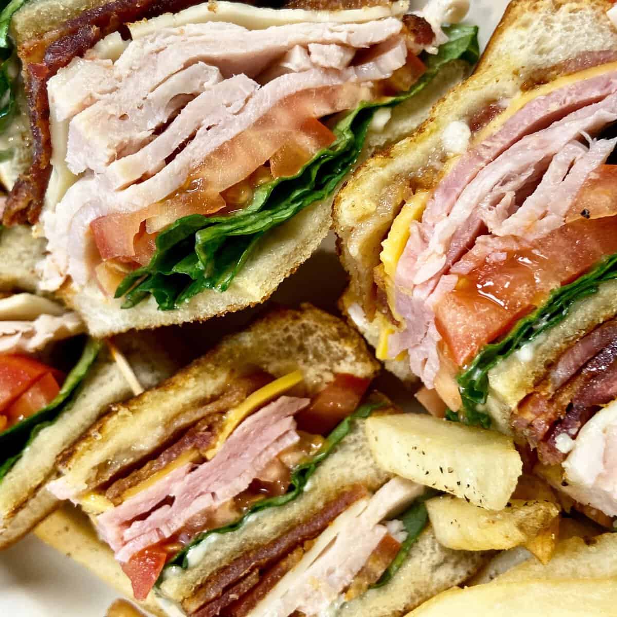 Club sandwich with fries at Schobels' Restaurant in Columbus, Texas