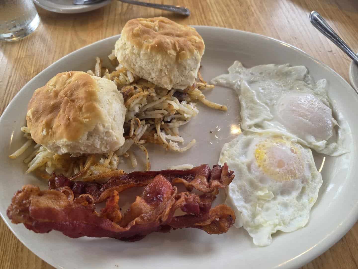Biscuits with gravy, bacon and eggs at Schobels' Restaurant in Columbus, Texas