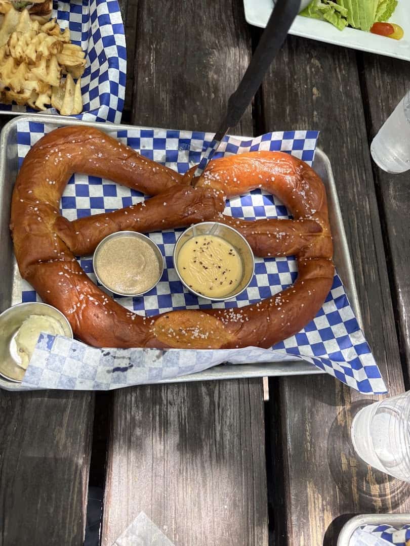 Giant Bavarian pretzel with mustard and beer cheese at Scholz Garten in Austin