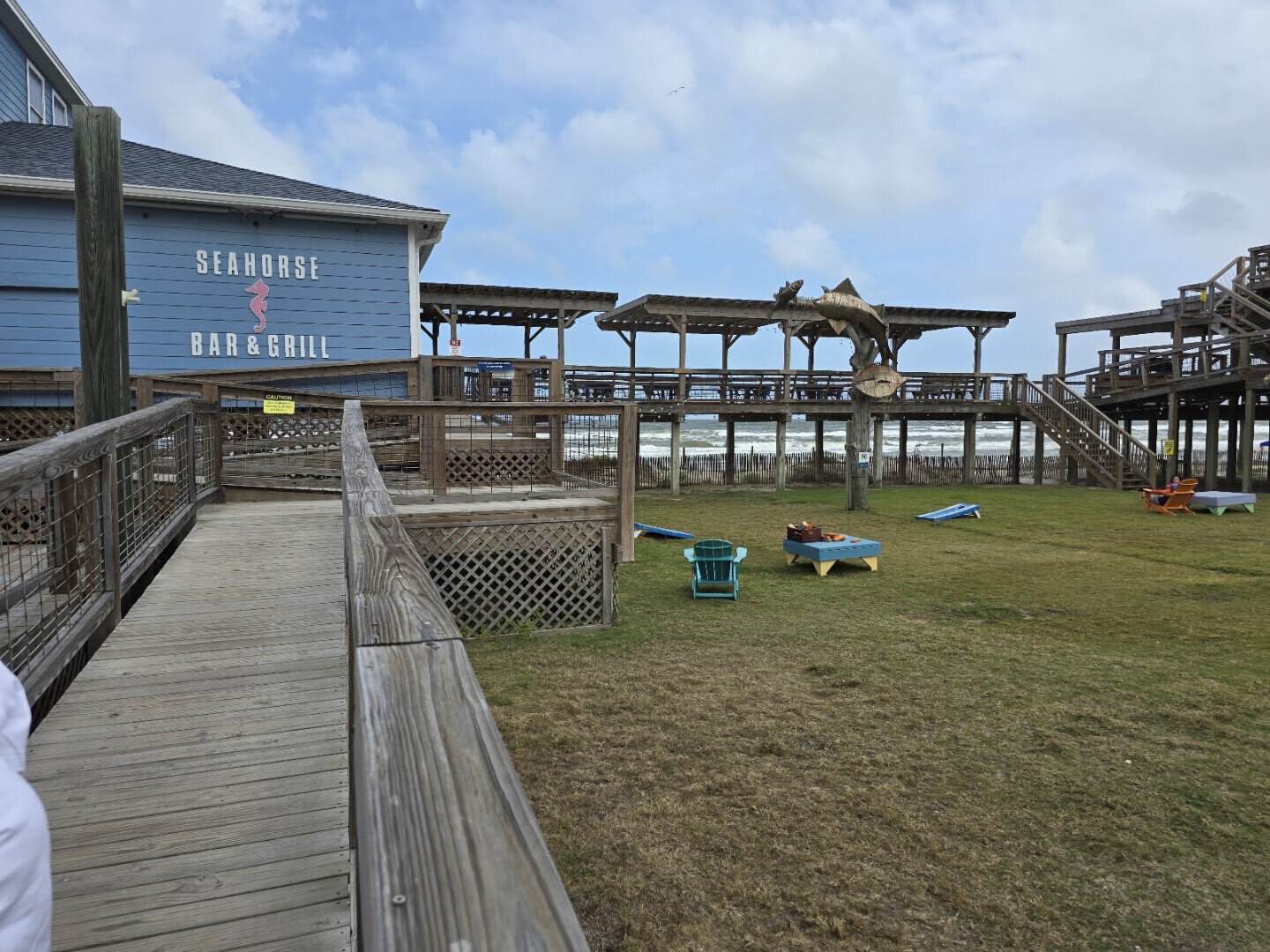 Sign on the building at Seahorse Bar and Grill in Surfside Beach, Texas