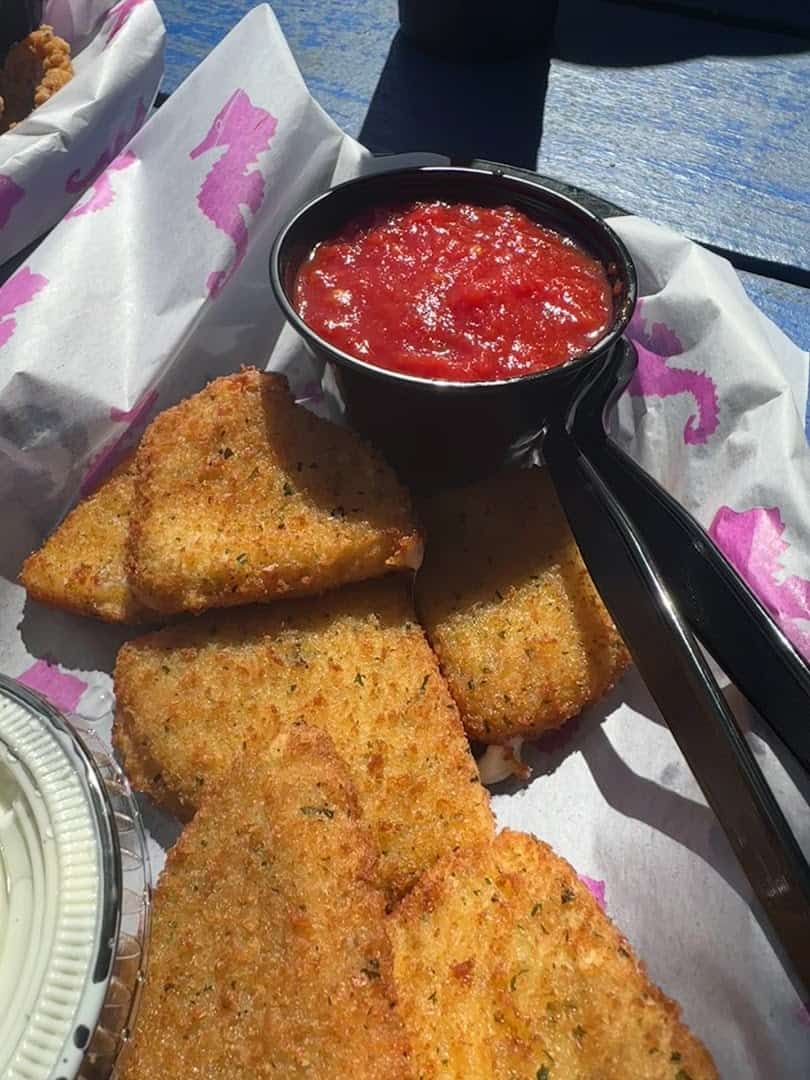 Fried appetizer with dipping sauce at Seahorse Bar & Grill in Surfside Beach