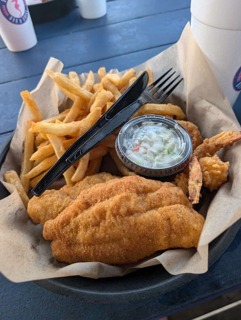Fried fish basket with fries at Seahorse Bar & Grill in Surfside Beach