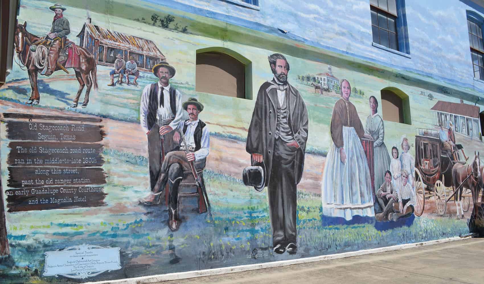 Mural of historic Seguin figures near the Magnolia Hotel in Seguin, Texas
