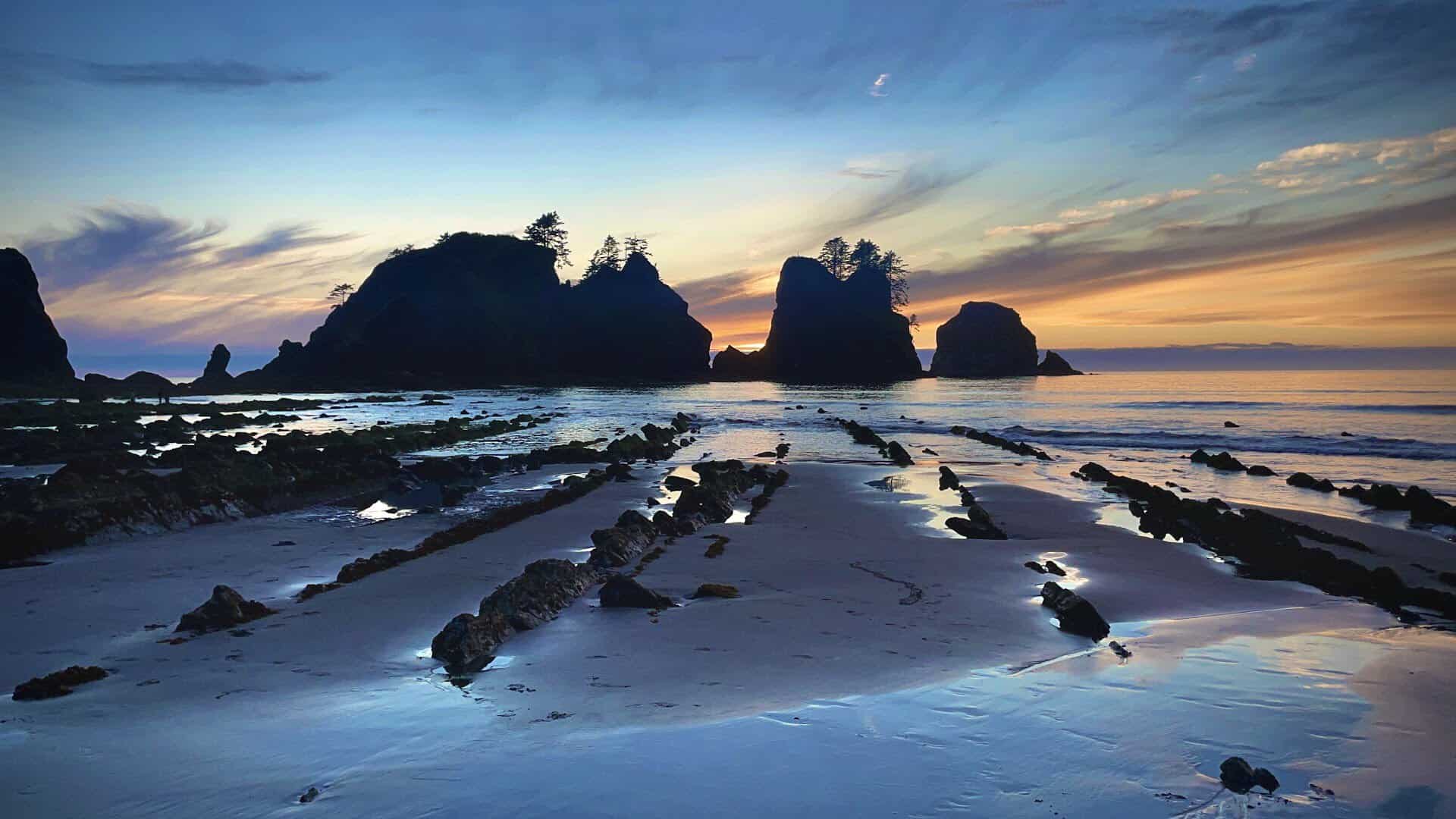 Sea stacks and tide pools at sunset on Shi Shi Beach, Washington