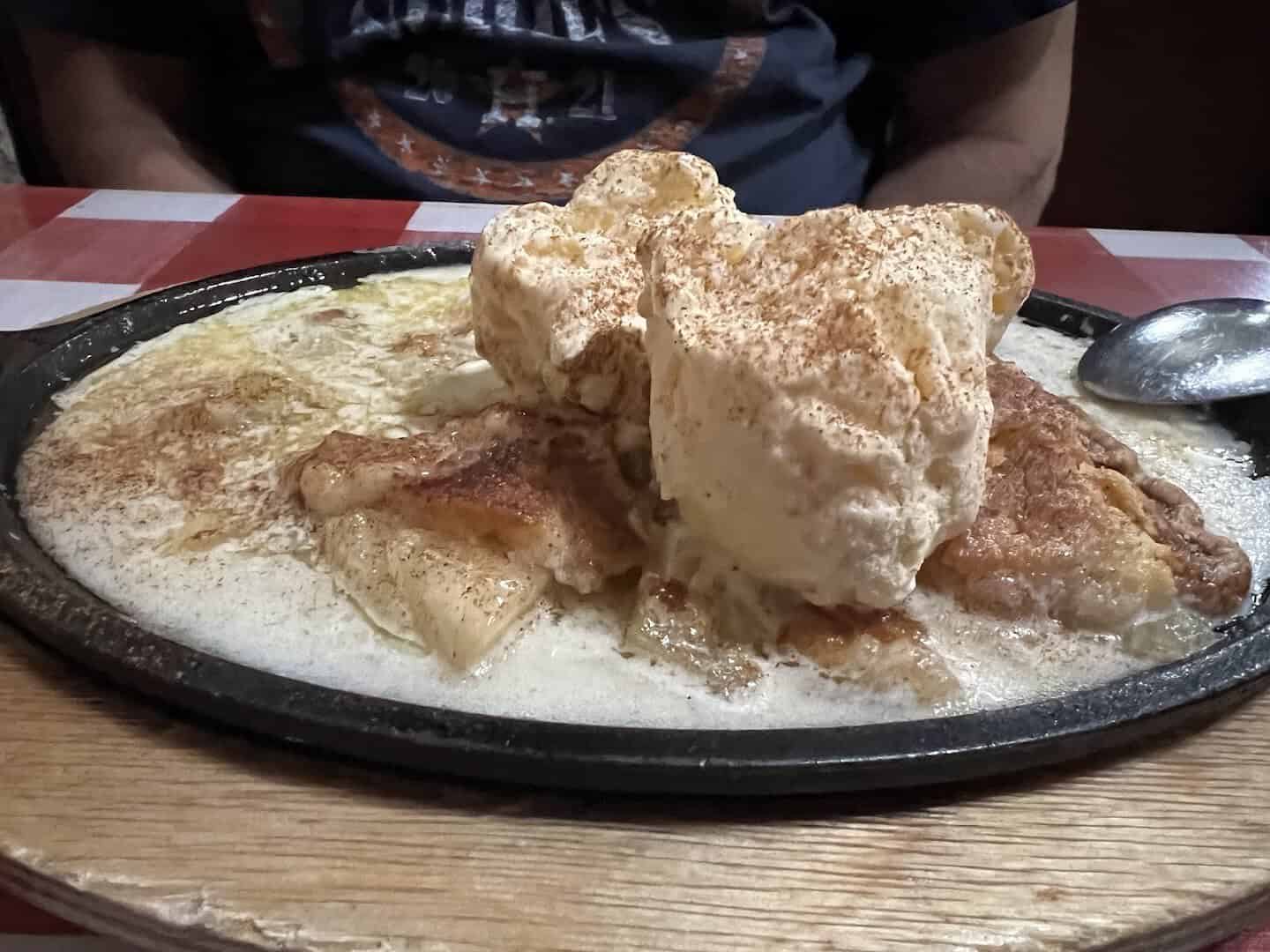 Skillet apple pie topped with vanilla ice cream at Texan Cafe and Pie Shop in Hutto, Texas