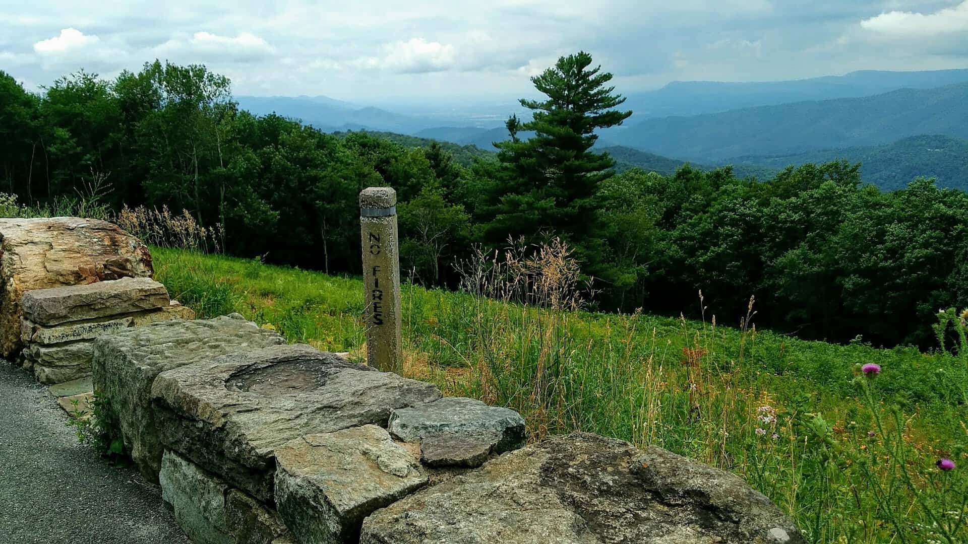 Stone wall overlook on Skyline Drive with Blue Ridge mountain views in Shenandoah National Park, Virginia