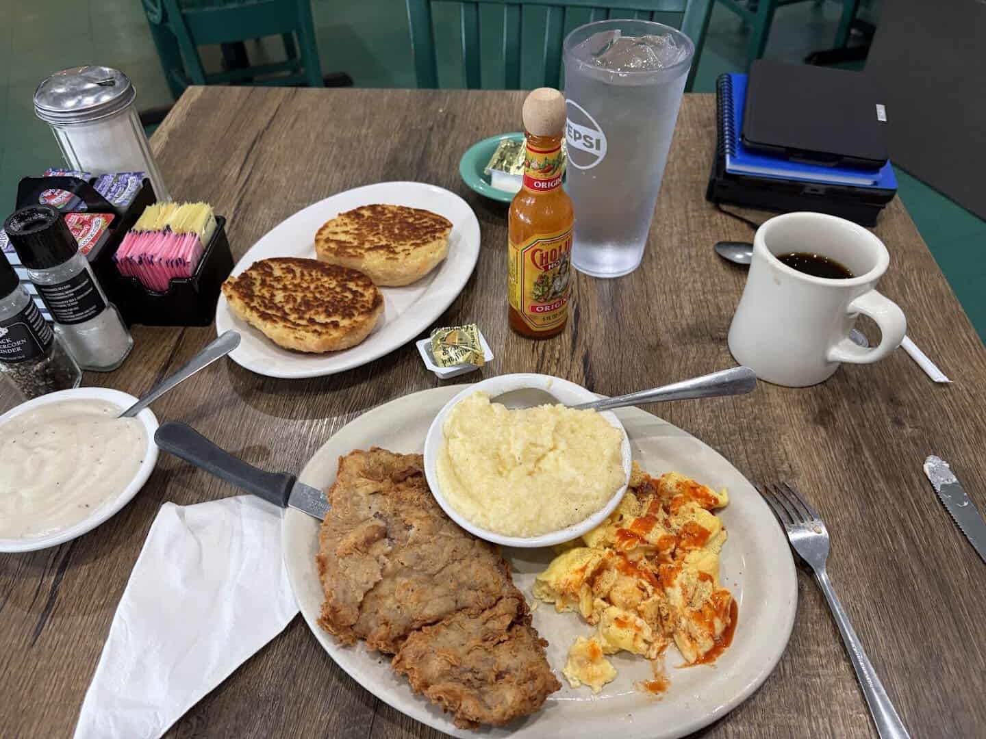 A Southern breakfast spread on the table at Bobbie's Southern Kitchen in San Antonio