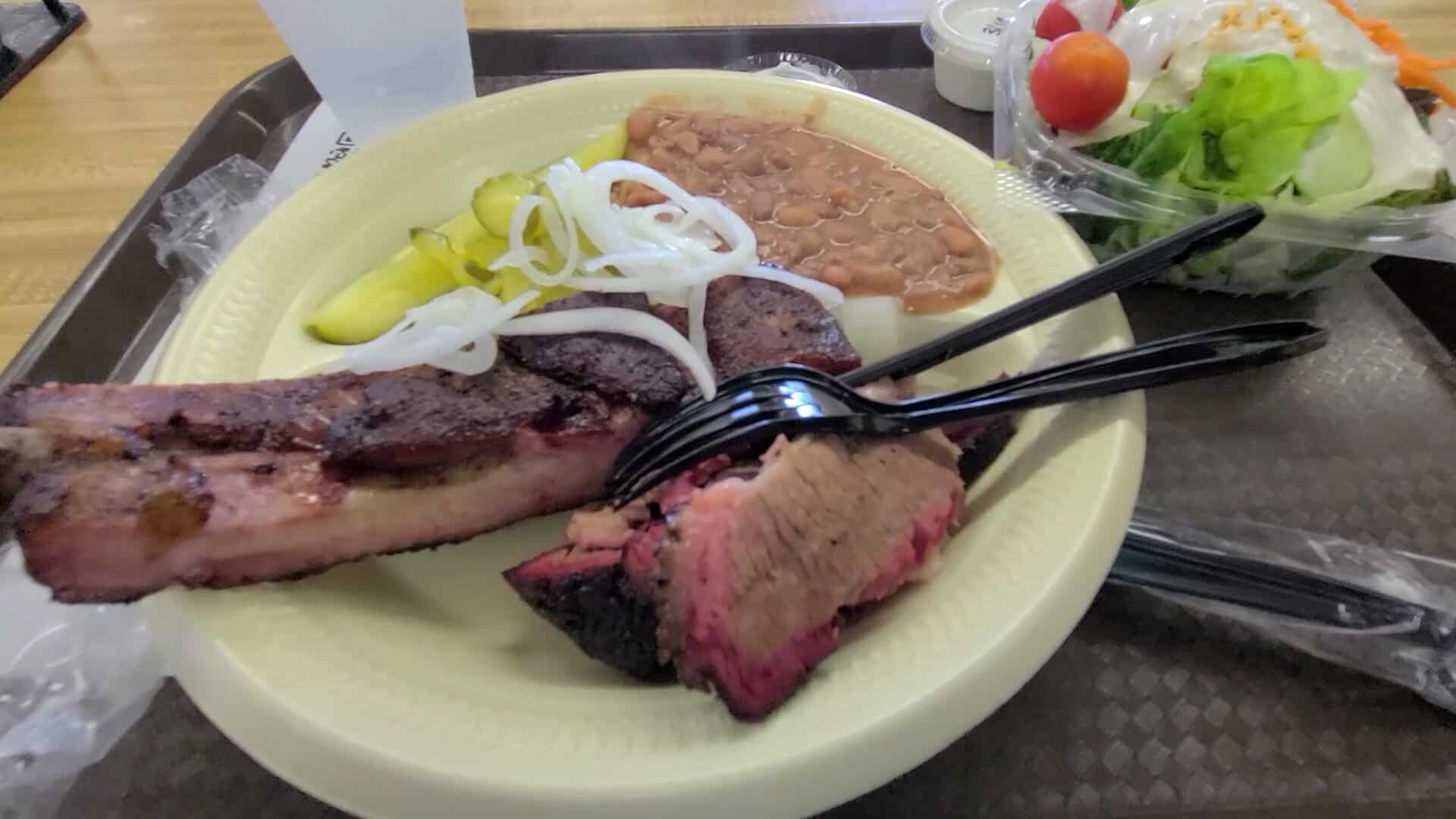 Smoked brisket with pinto beans at Southside Market and Barbeque in Elgin, Texas