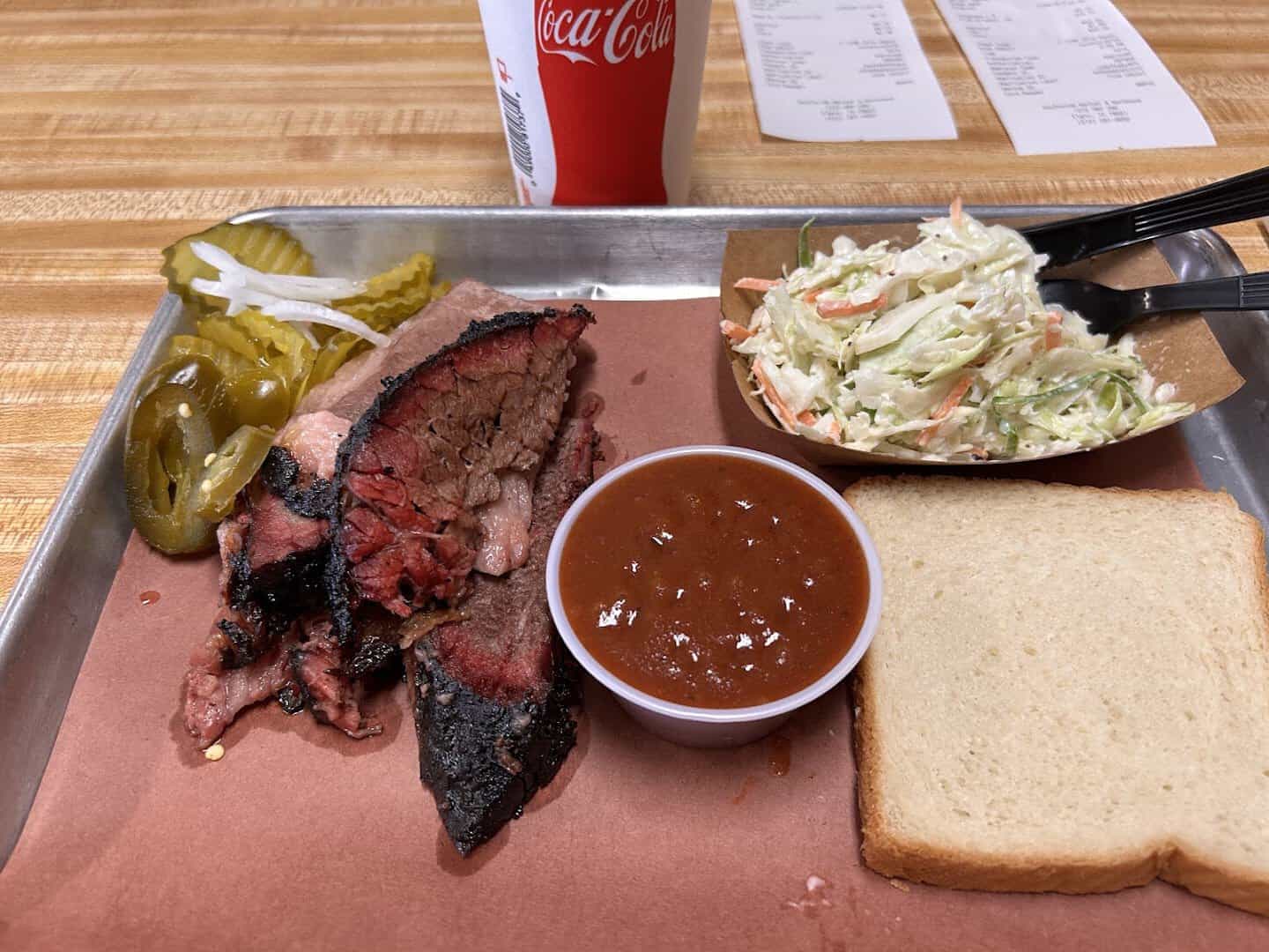 Smoked brisket plate with coleslaw at Southside Market and Barbeque in Elgin, Texas