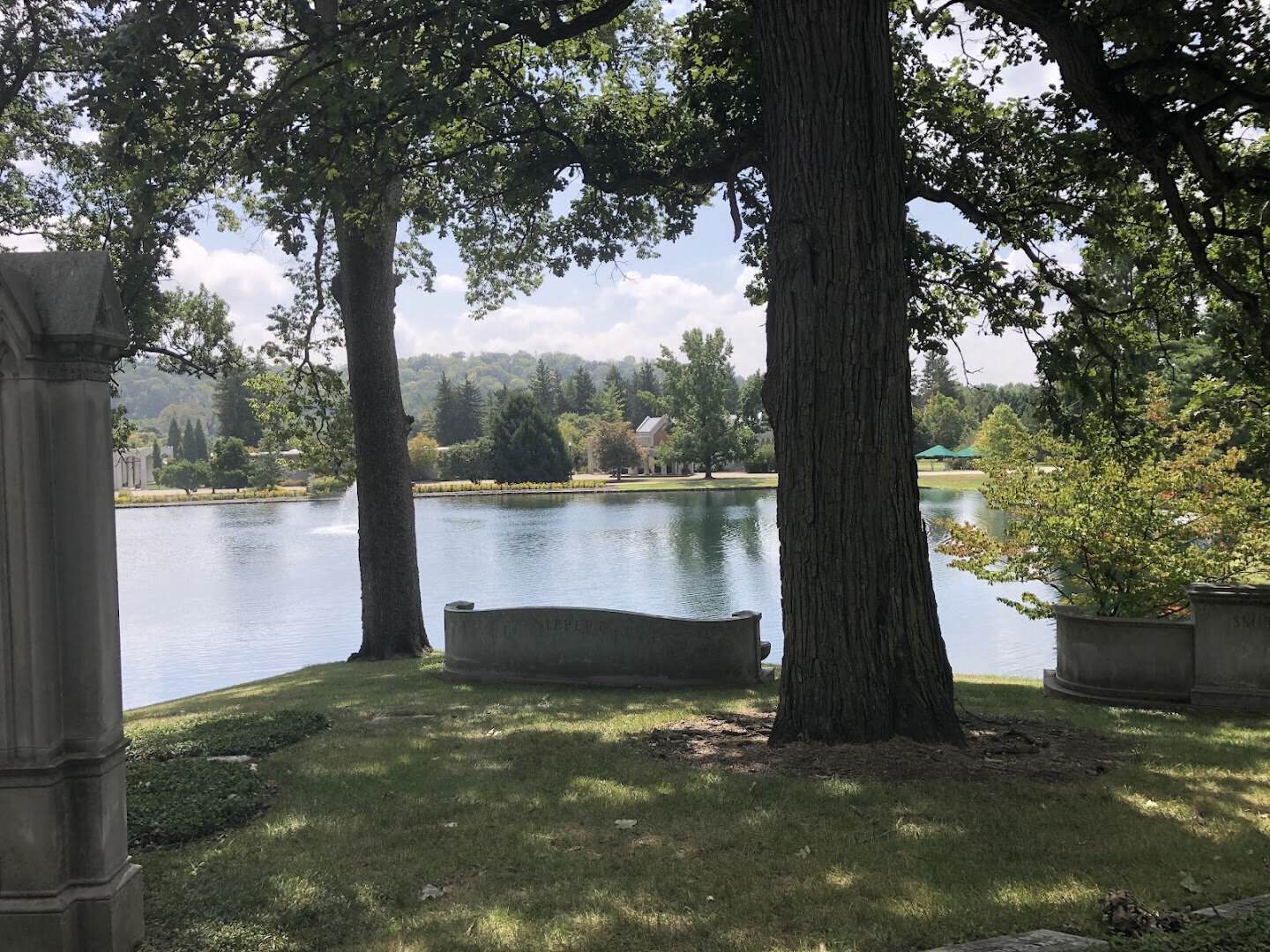Towering oaks framing a tranquil lake at Spring Grove Cemetery and Arboretum in Cincinnati, Ohio