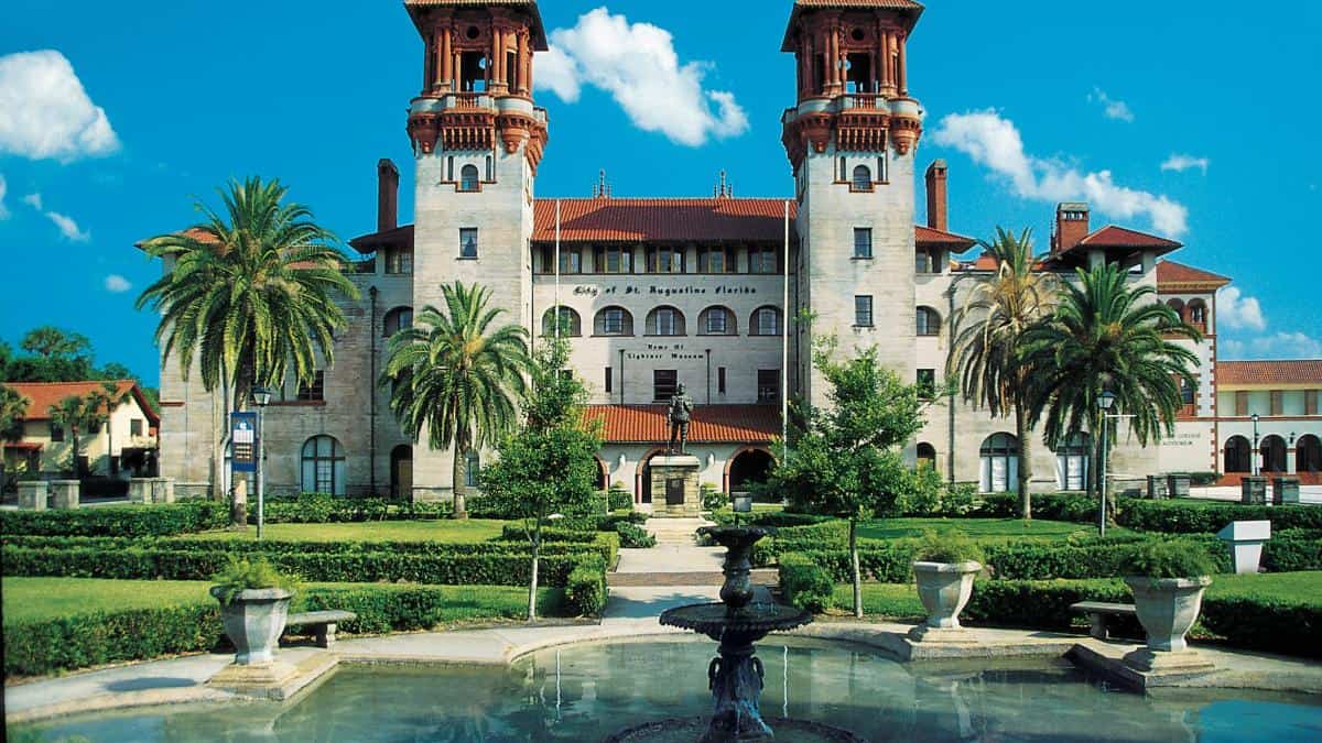 Lightner Museum building with palm trees and fountain in St. Augustine, Florida