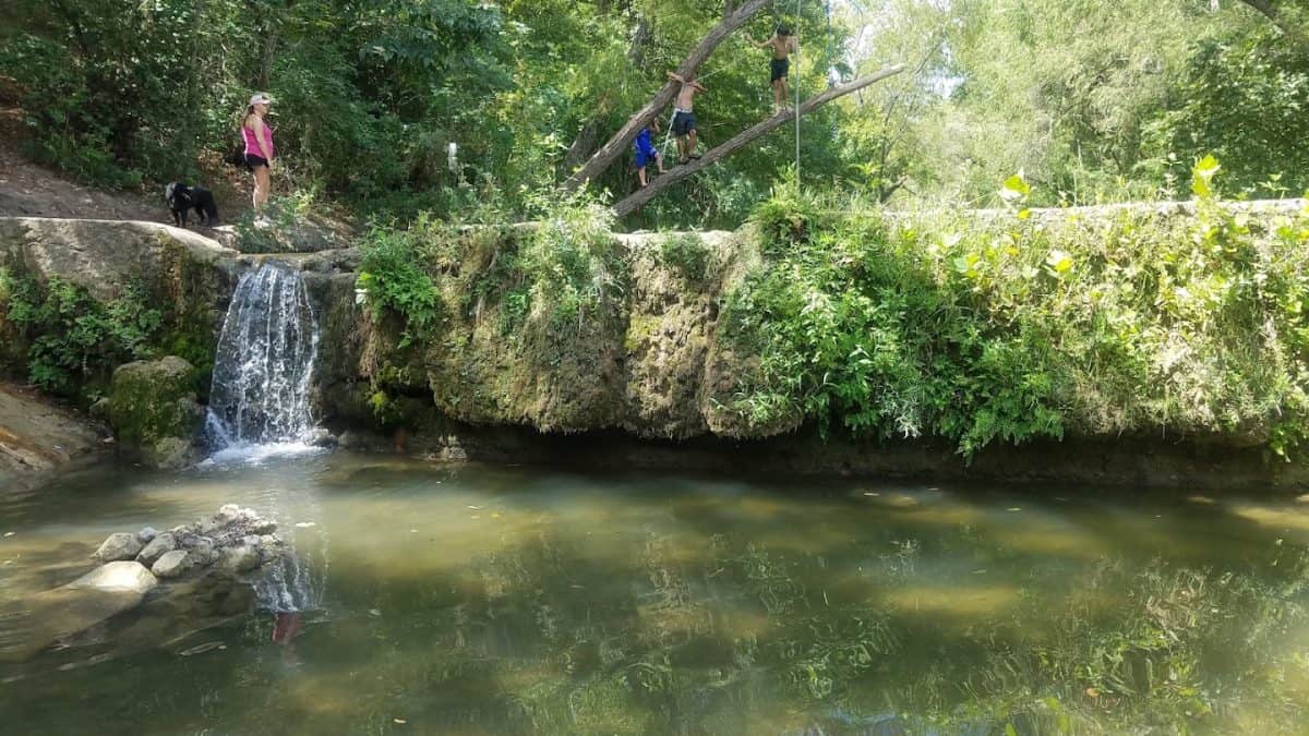 This Hidden Texas Trail Leads to Limestone Waterfalls and Spring Wildflowers