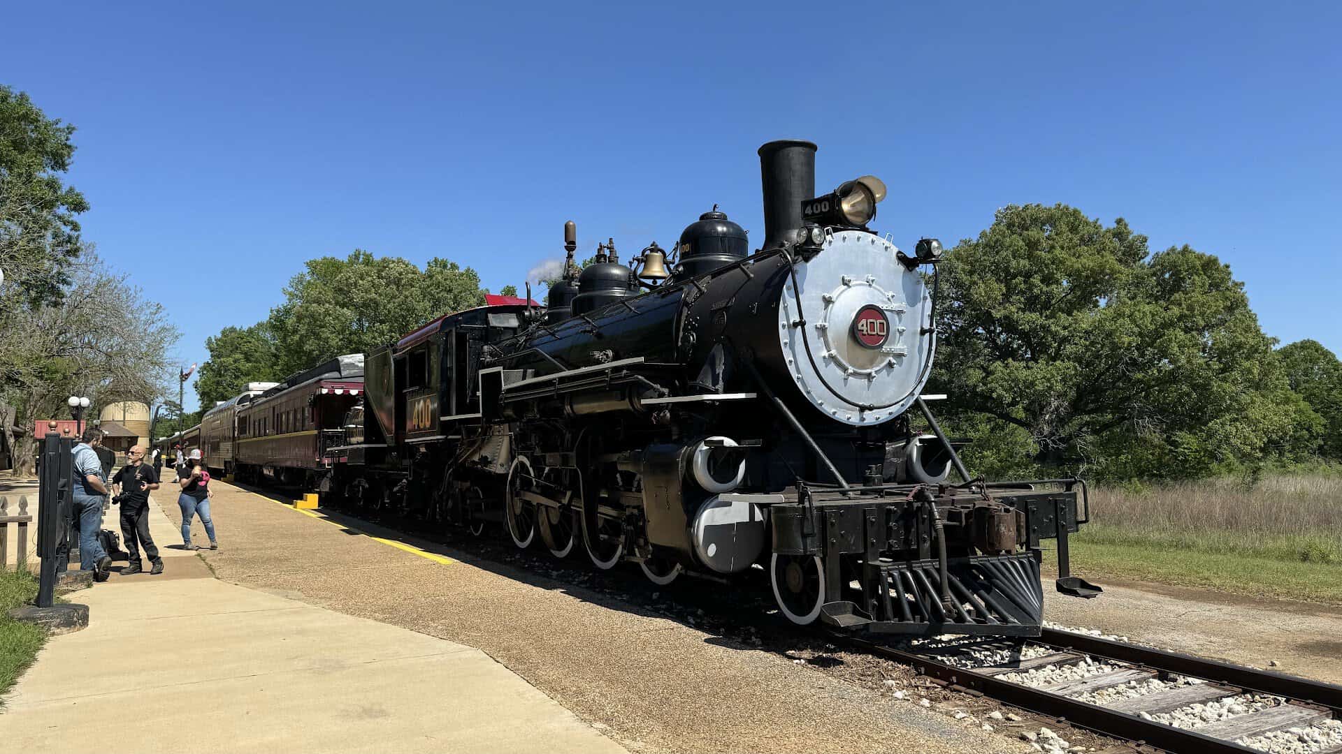 Historic black steam locomotive at the Texas State Railroad platform