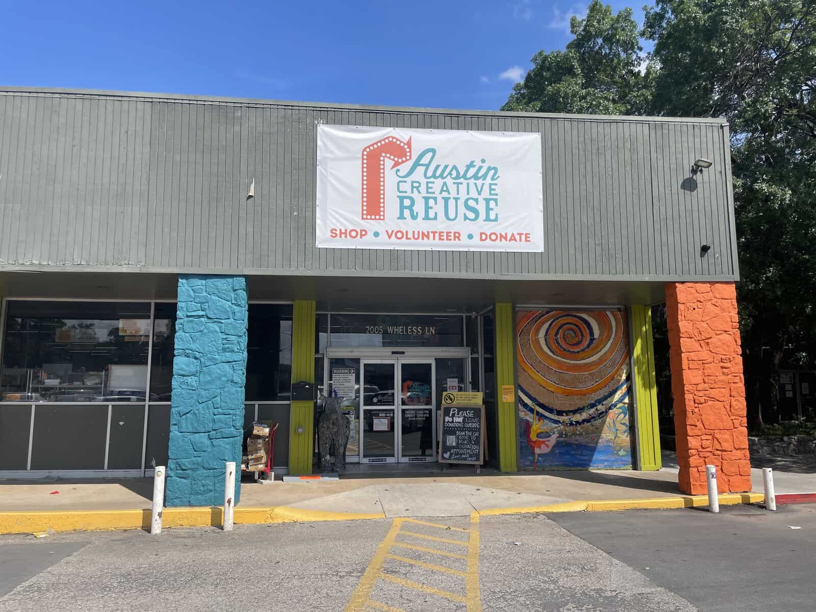 Austin Creative Reuse storefront sign reading Shop Volunteer Donate